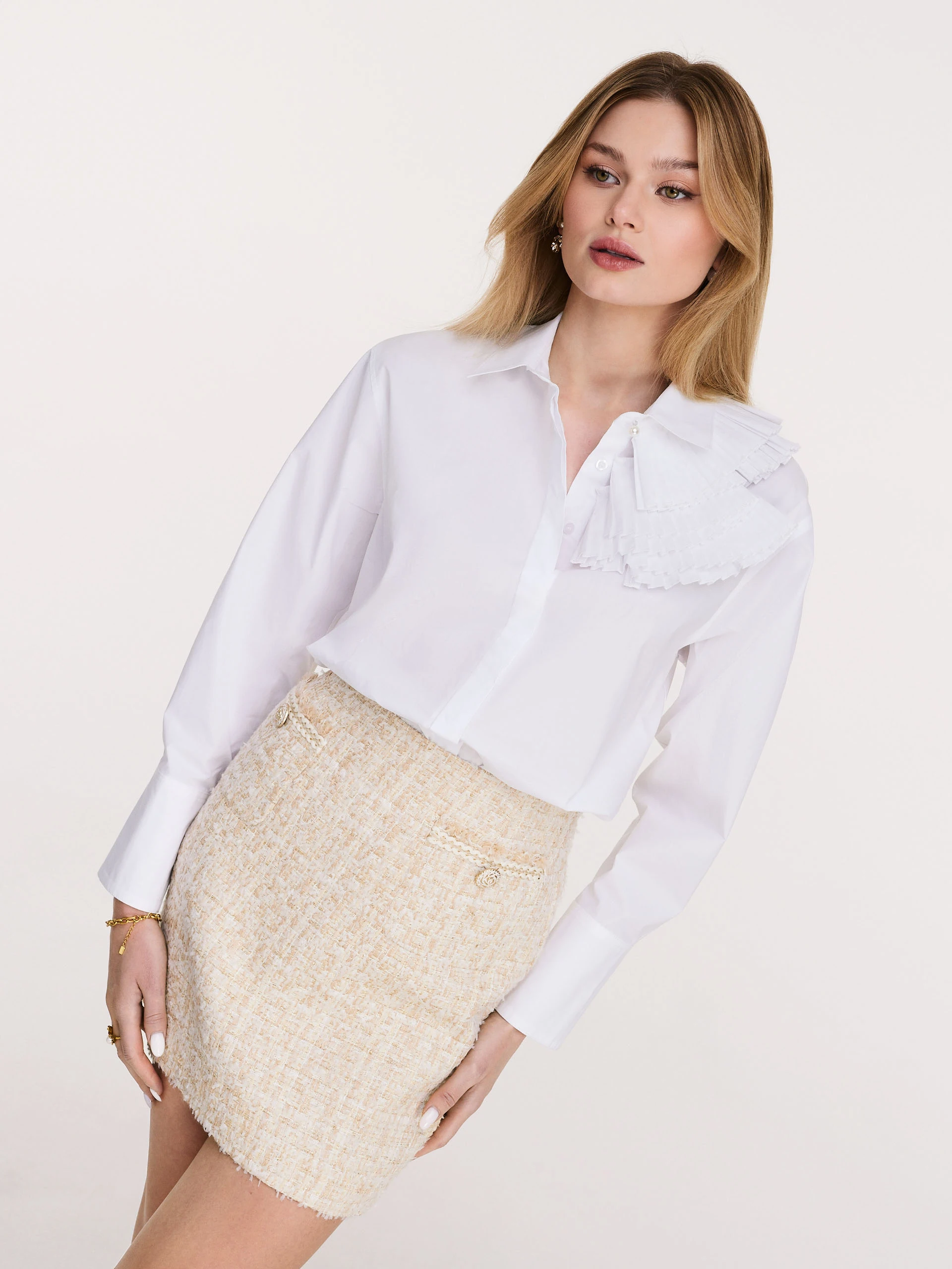 White cotton shirt with decorative ruffles