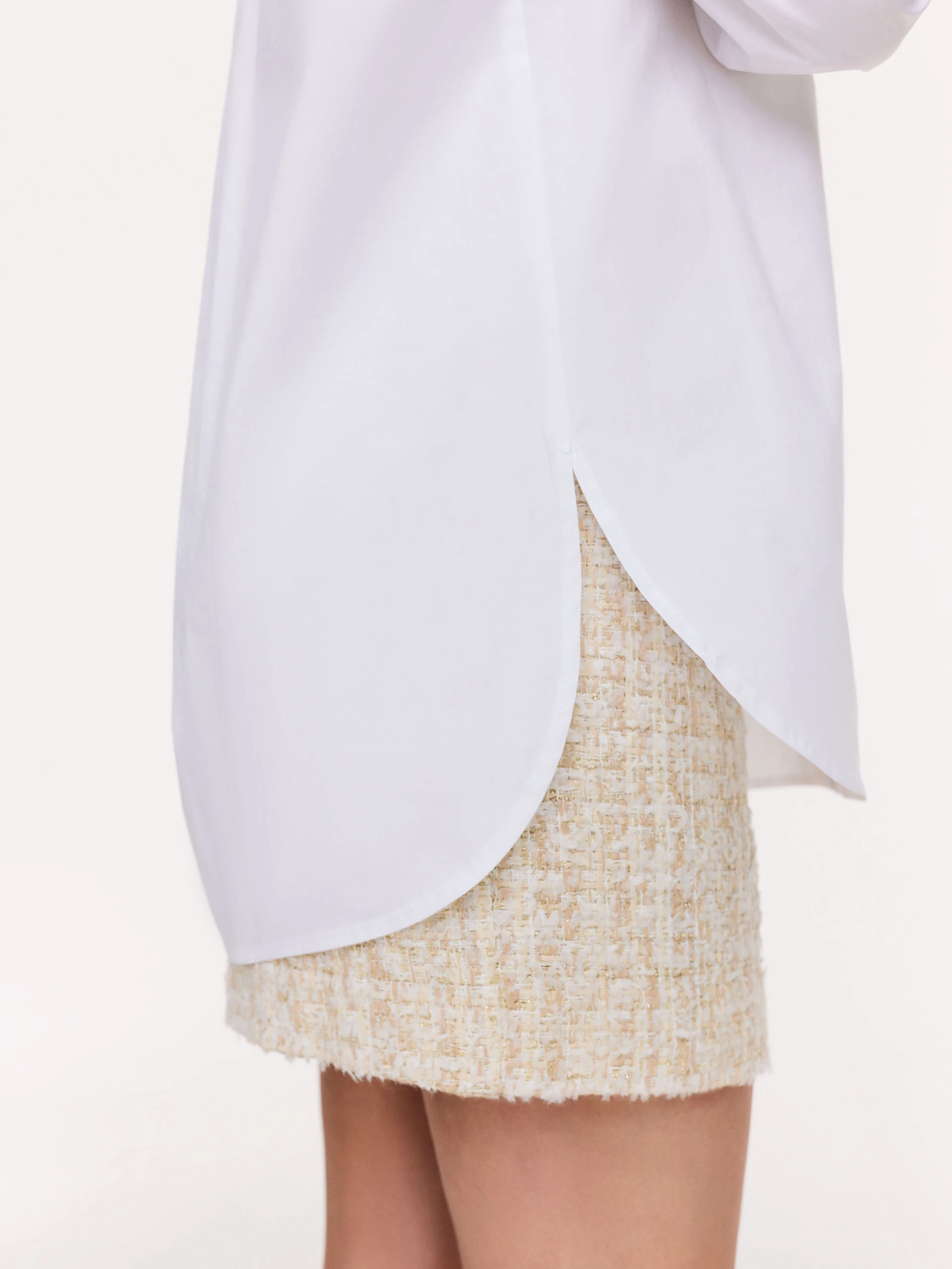 White cotton shirt with decorative ruffles