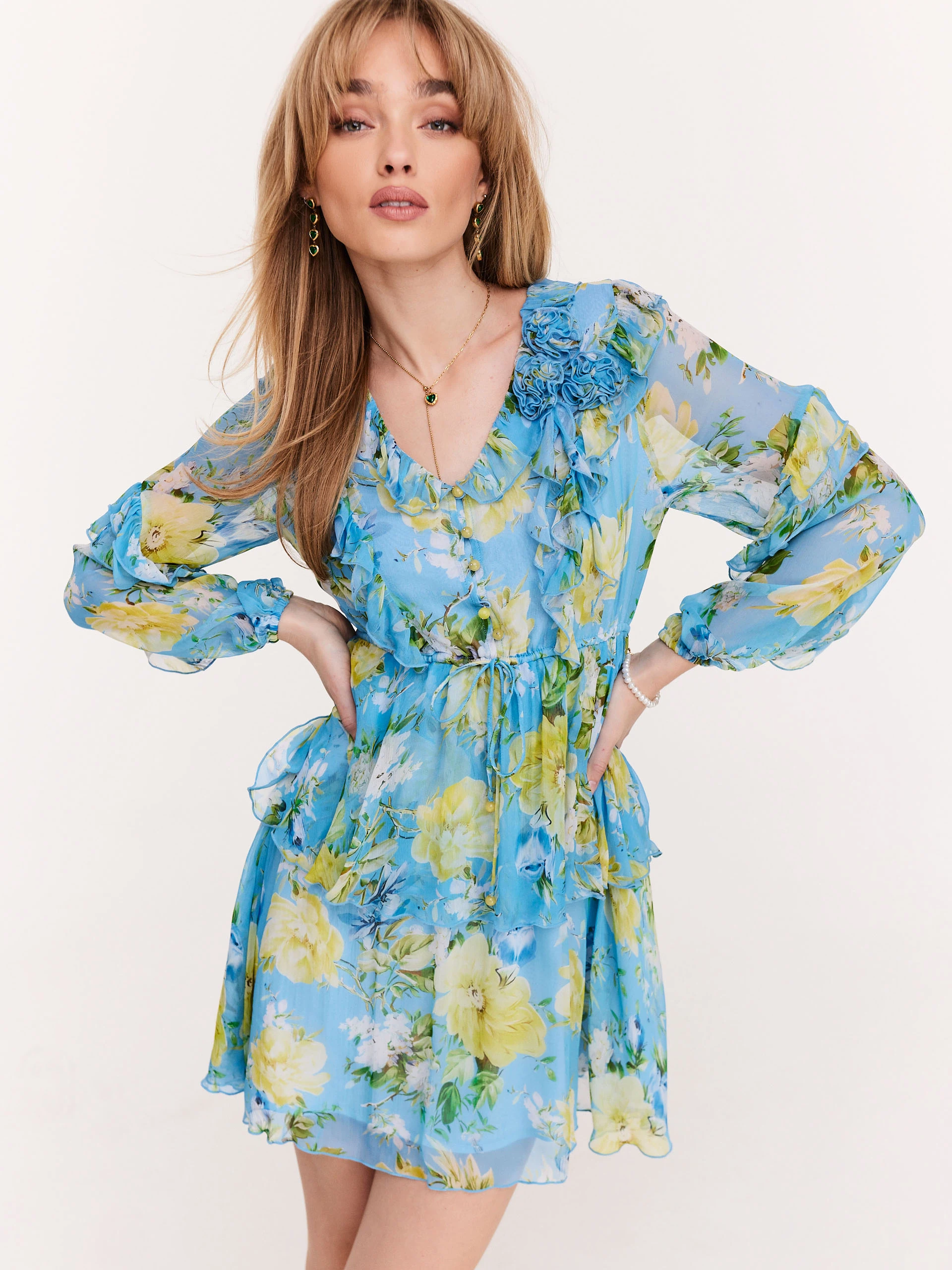 Blue dress with frills in yellow flowers