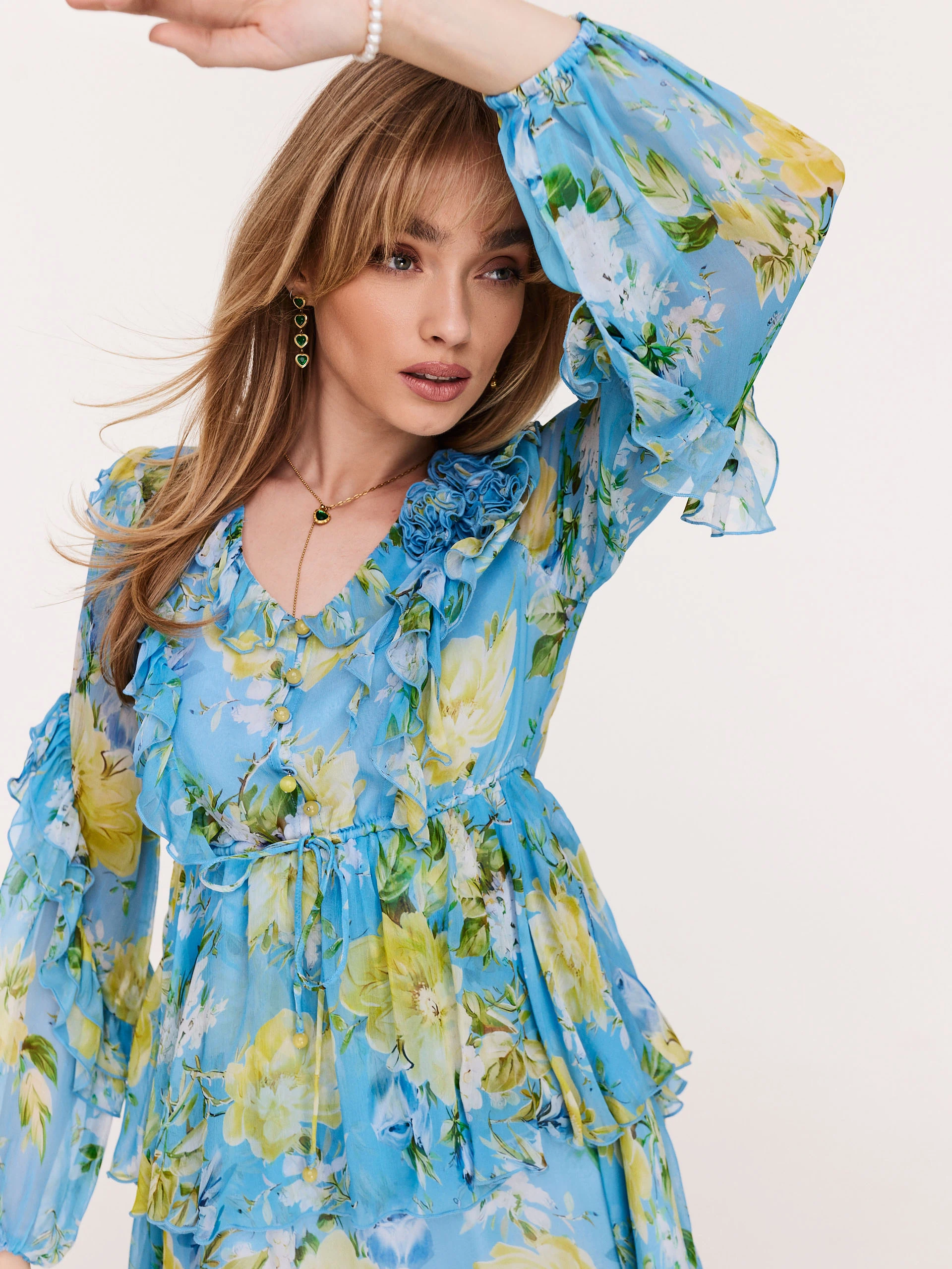 Blue dress with frills in yellow flowers