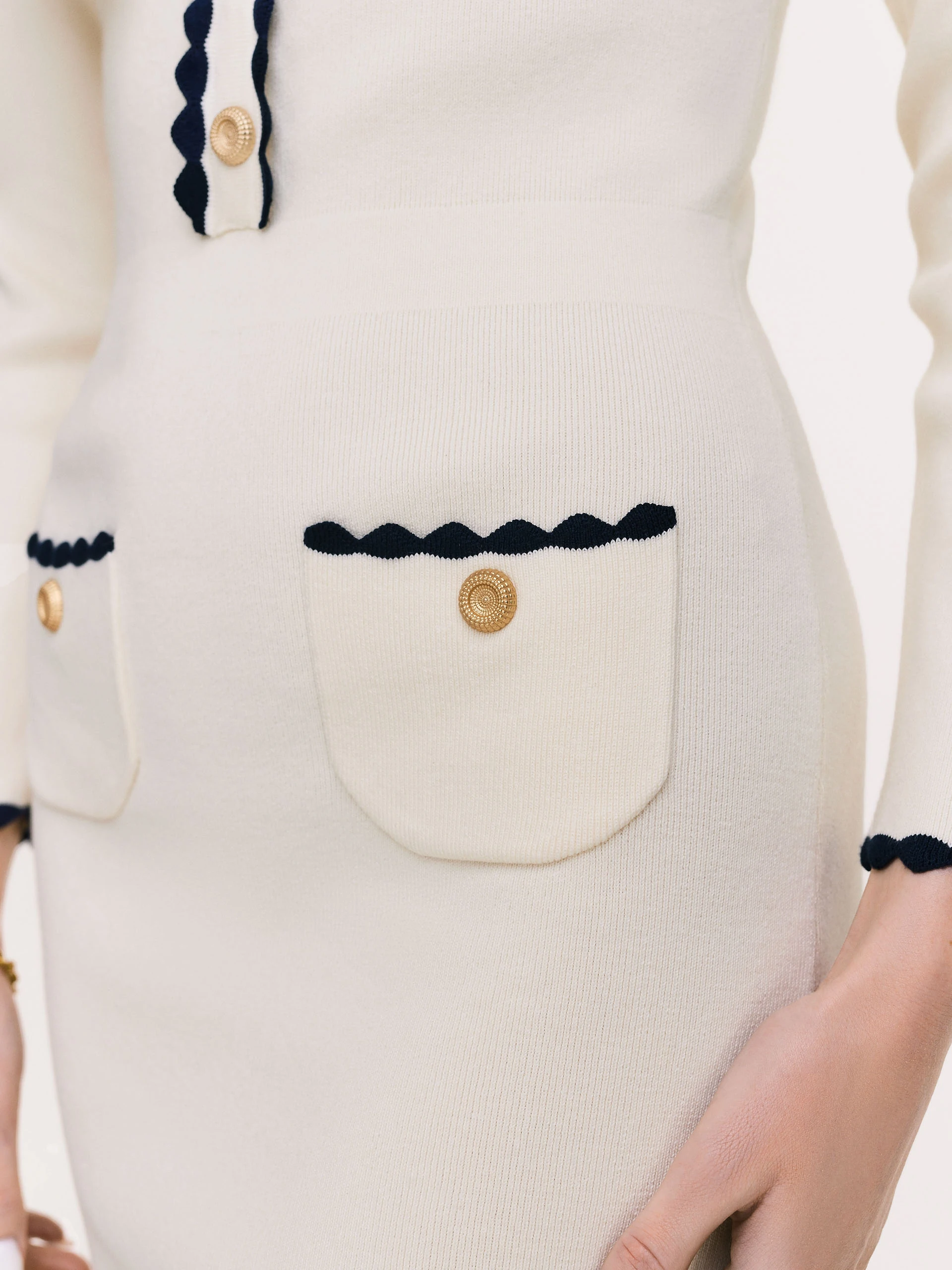 Knitted fitted dress in cream color