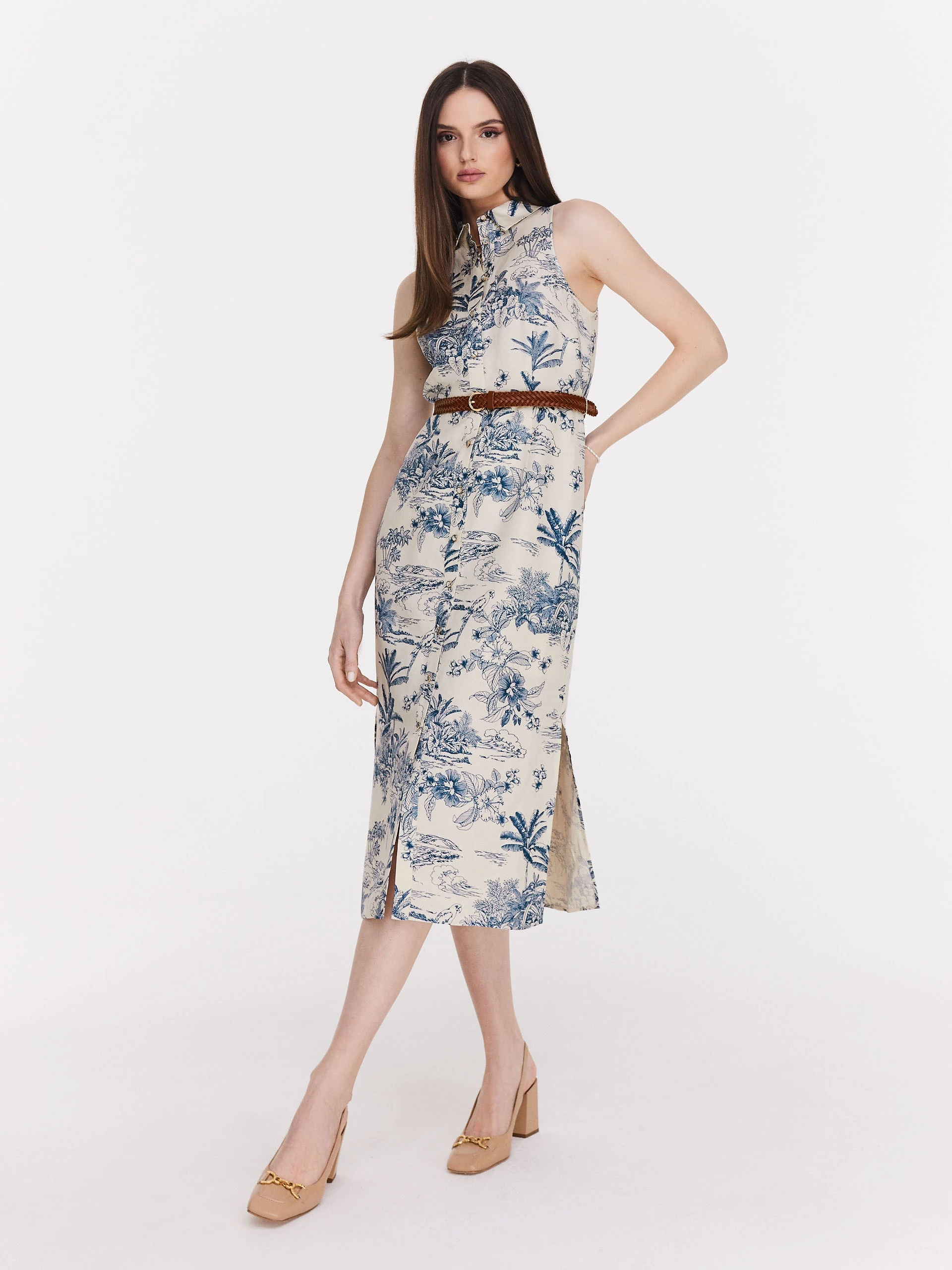 White knee-length dress with blue patterns