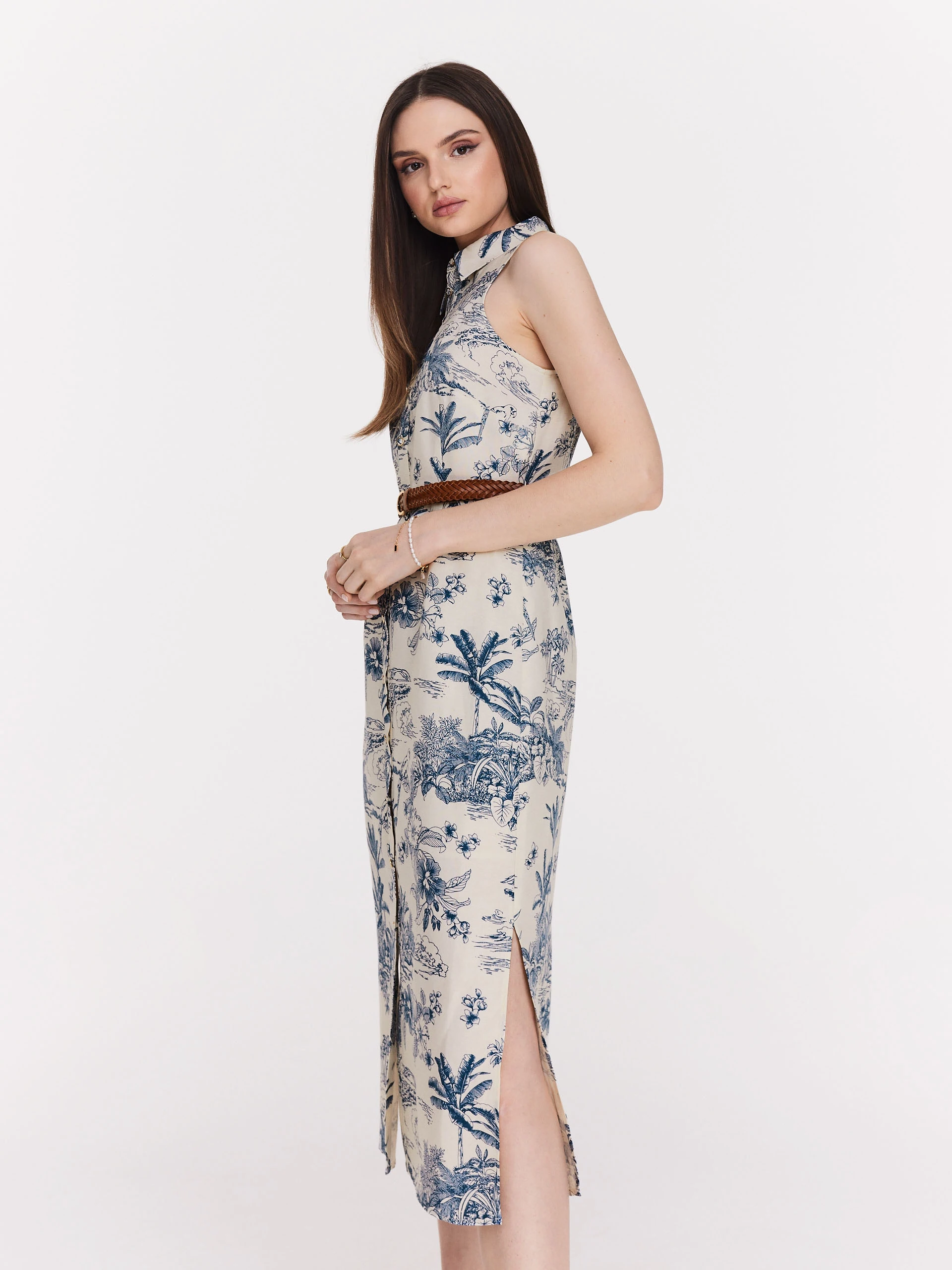 White knee-length dress with blue patterns