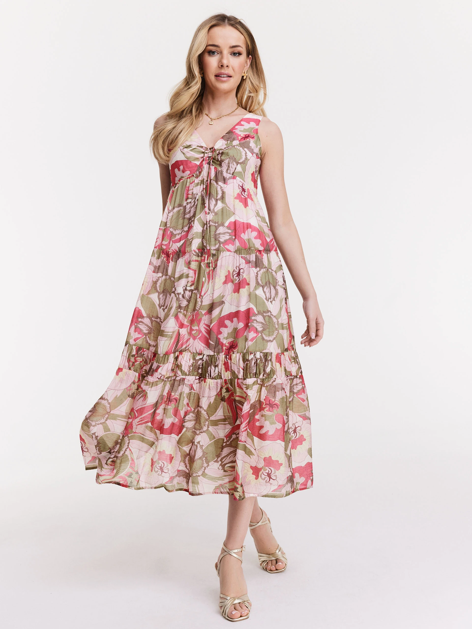 Loose pink dress with floral patterns