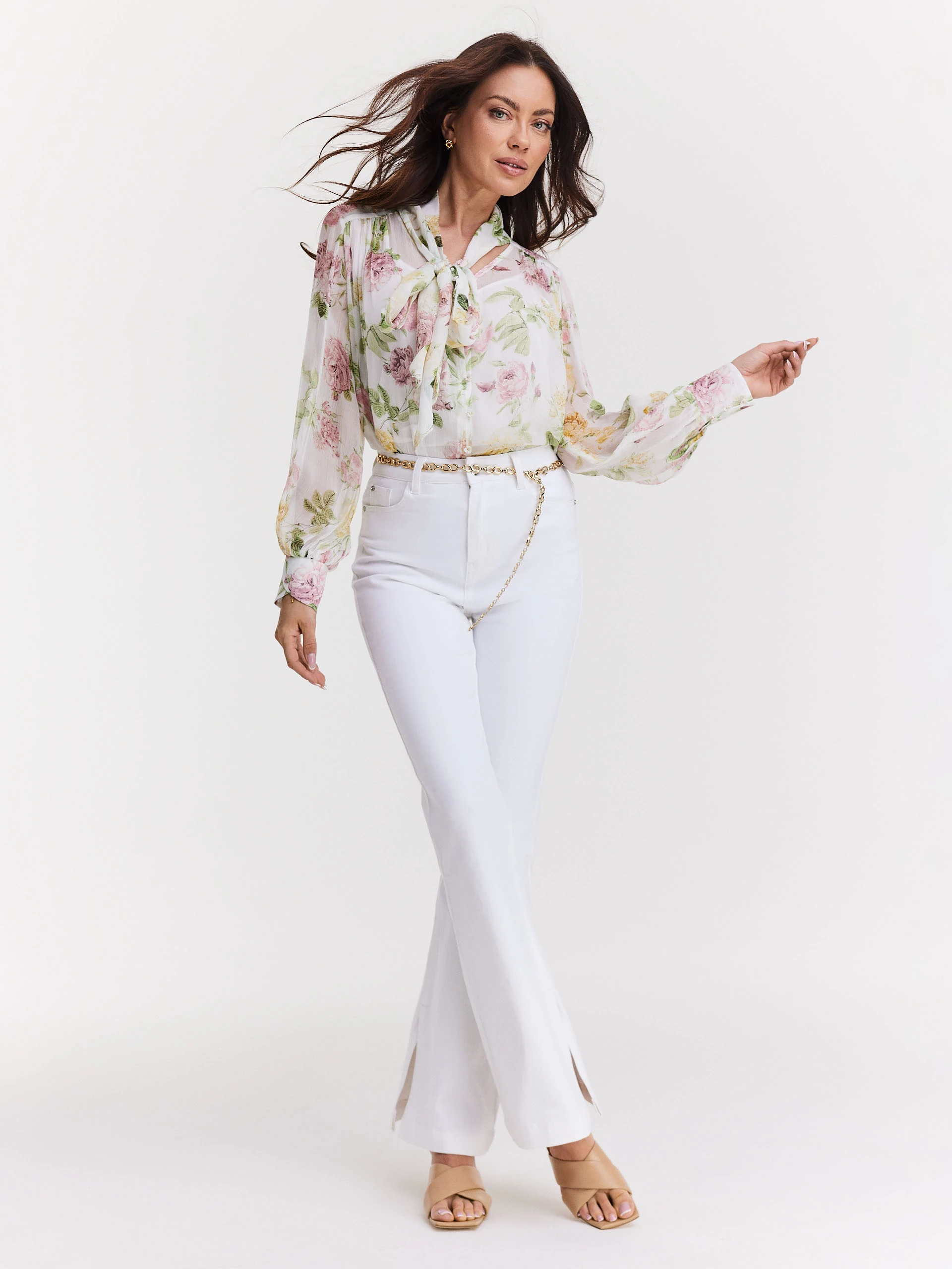 White cotton pants with flared legs