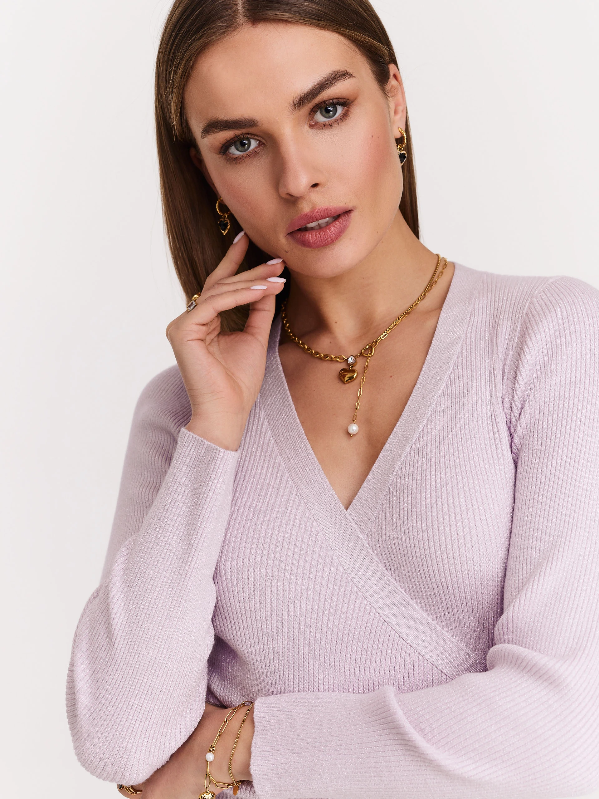 Light pink sweater with shimmering threads