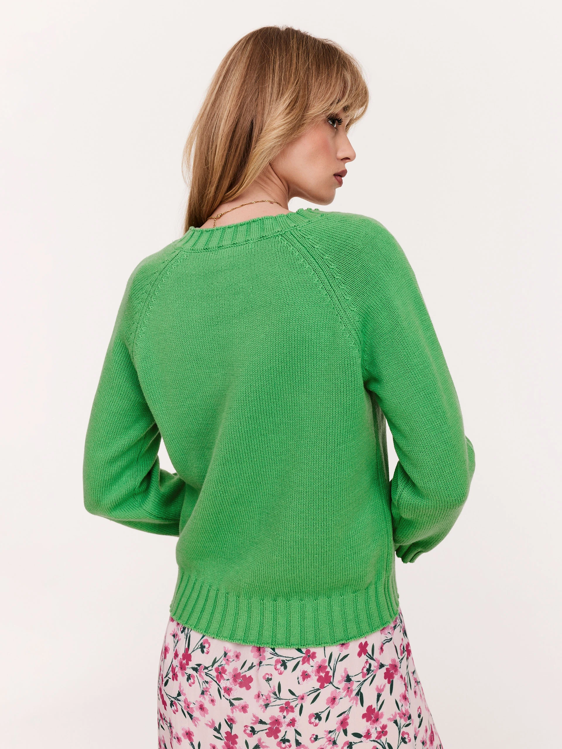 Green sweater with a heart neckline