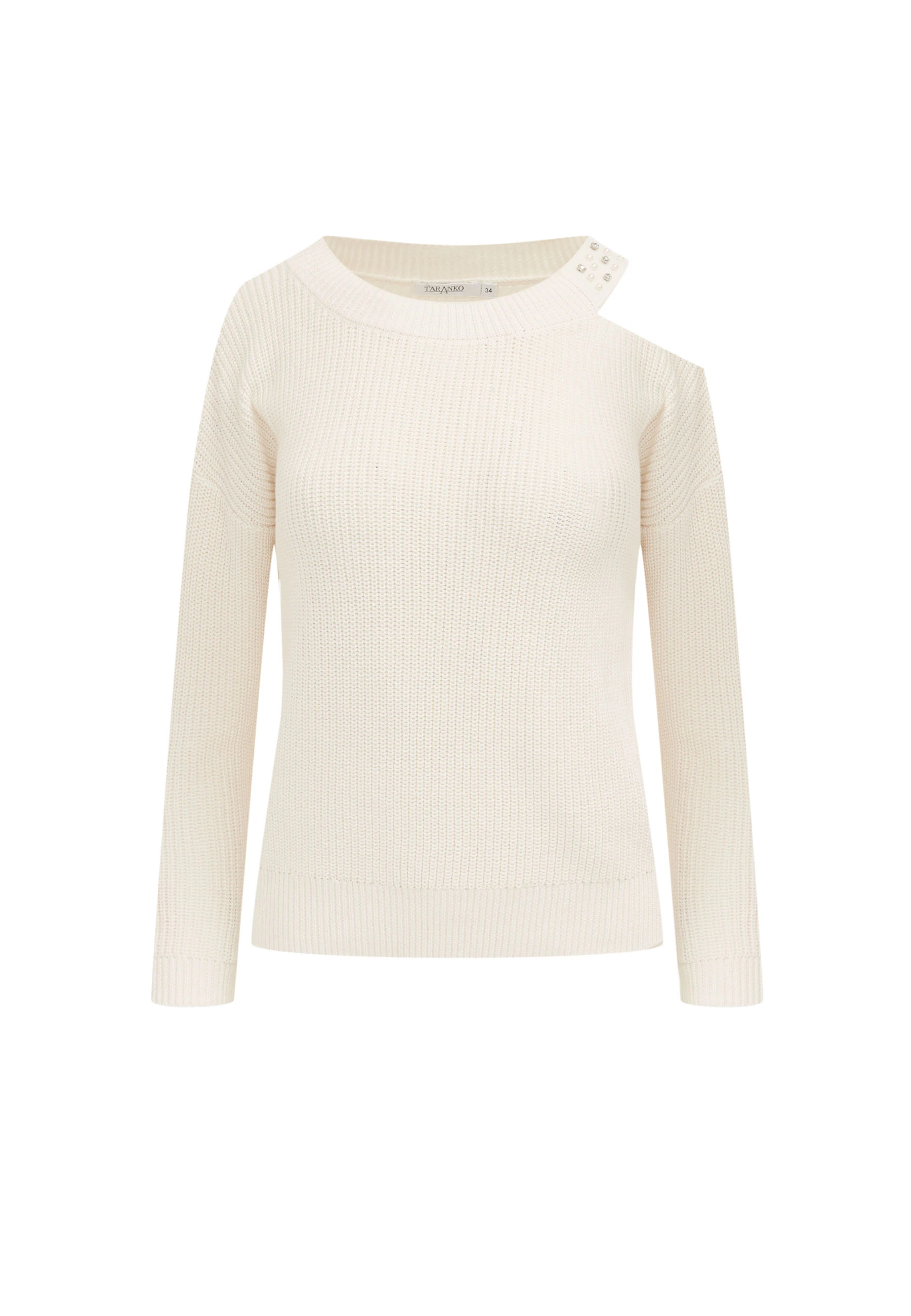 Cream sweater with striking cutouts