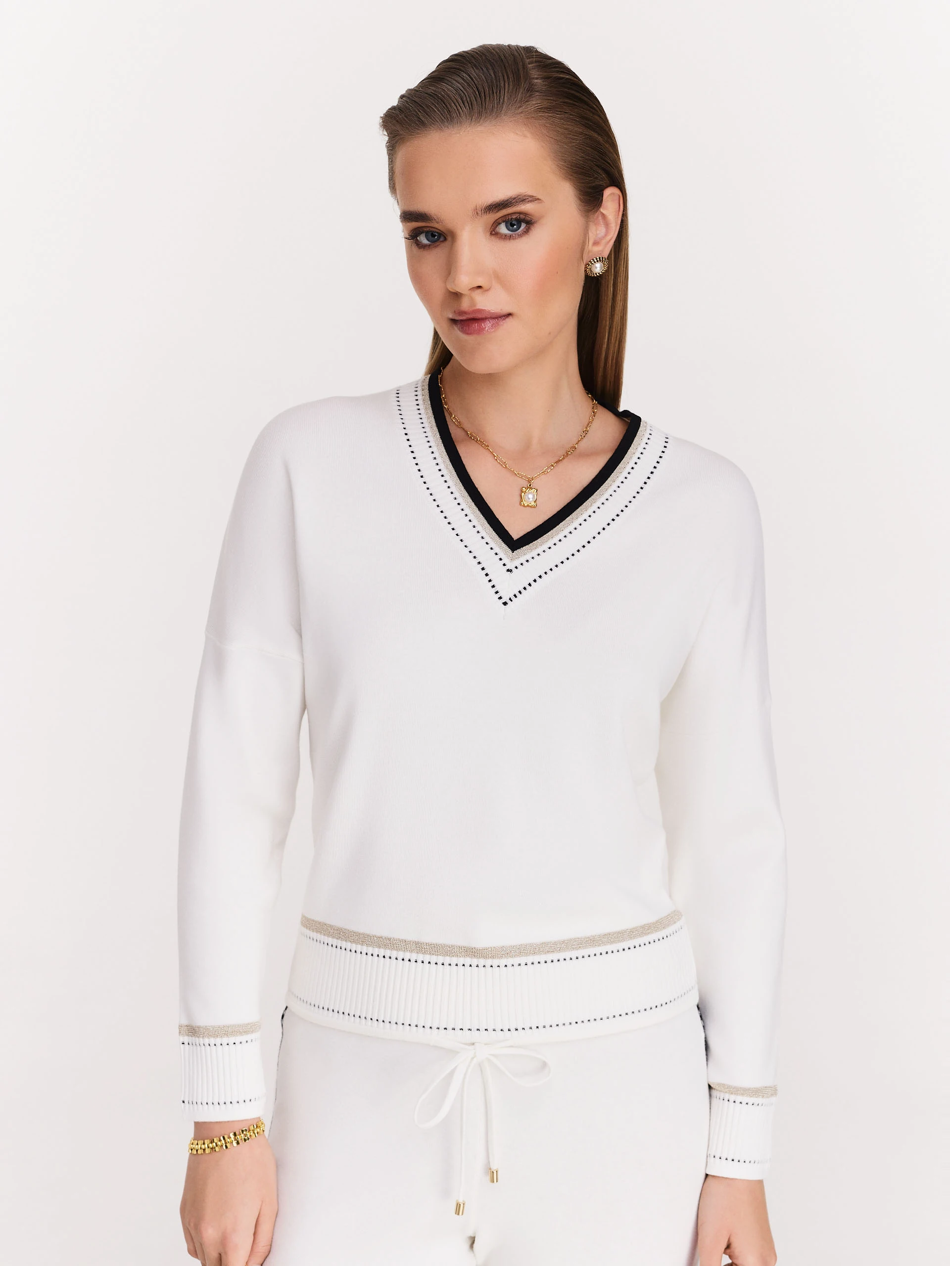 Cream sweater with V neckline