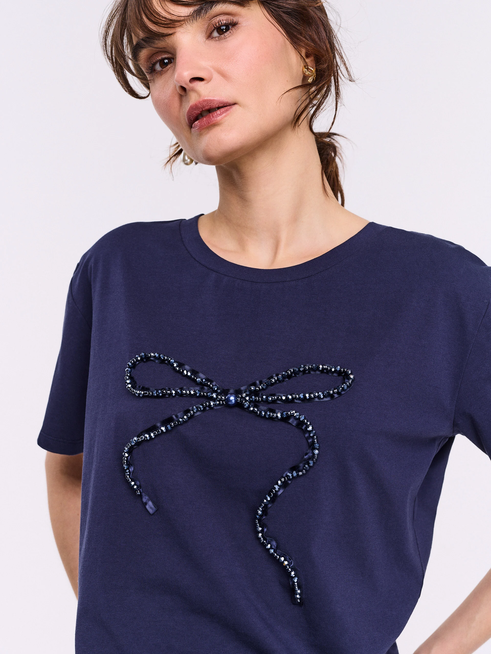 Navy blue cotton blouse with short sleeves and bow