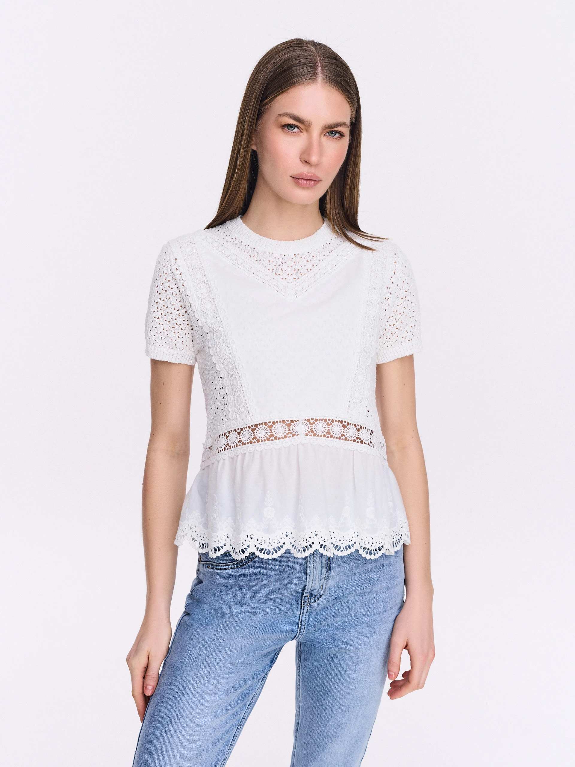 White blouse with peplum and lace details
