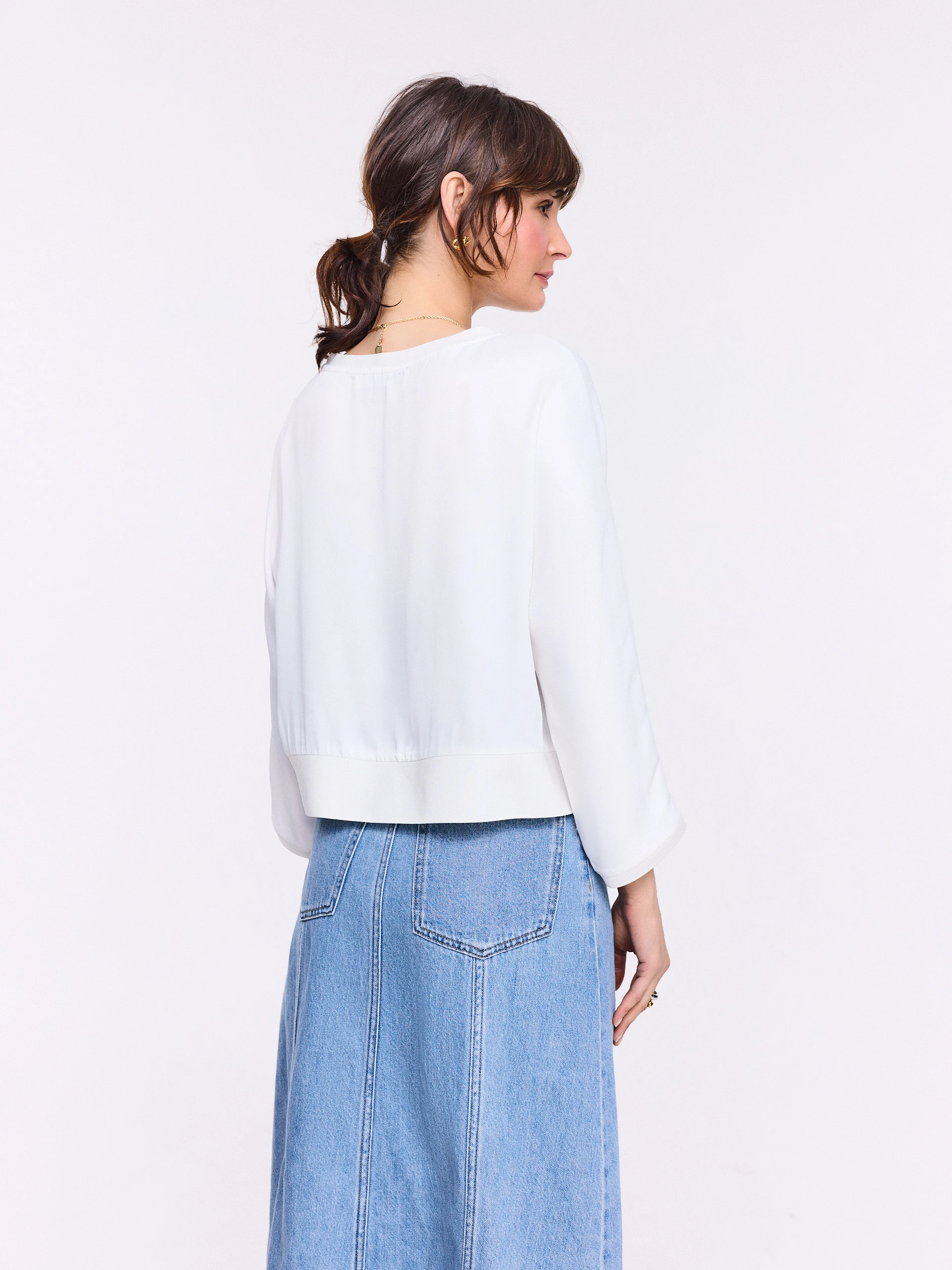 White elegant blouse made of satin viscose