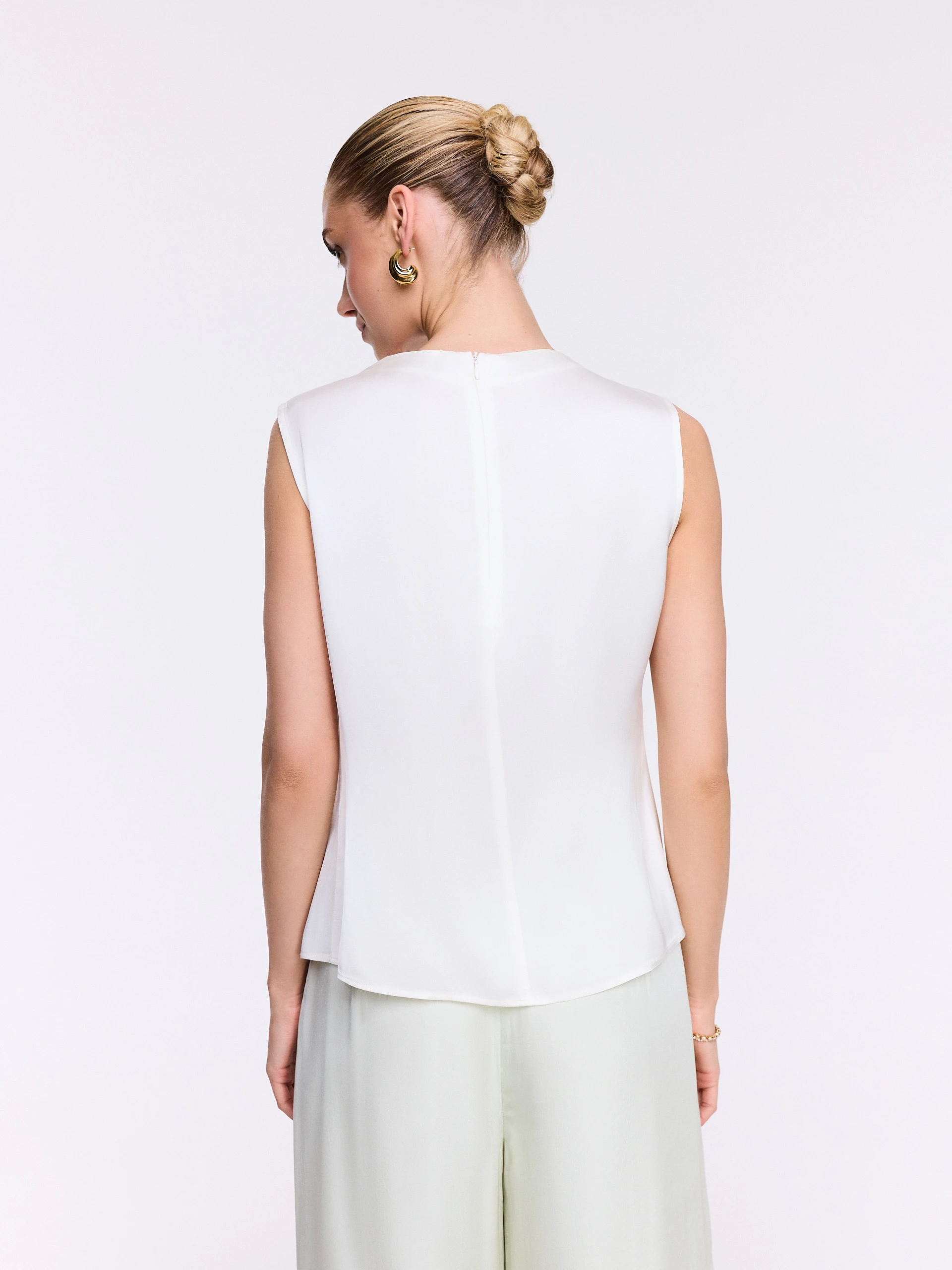 Asymmetrical sleeveless blouse