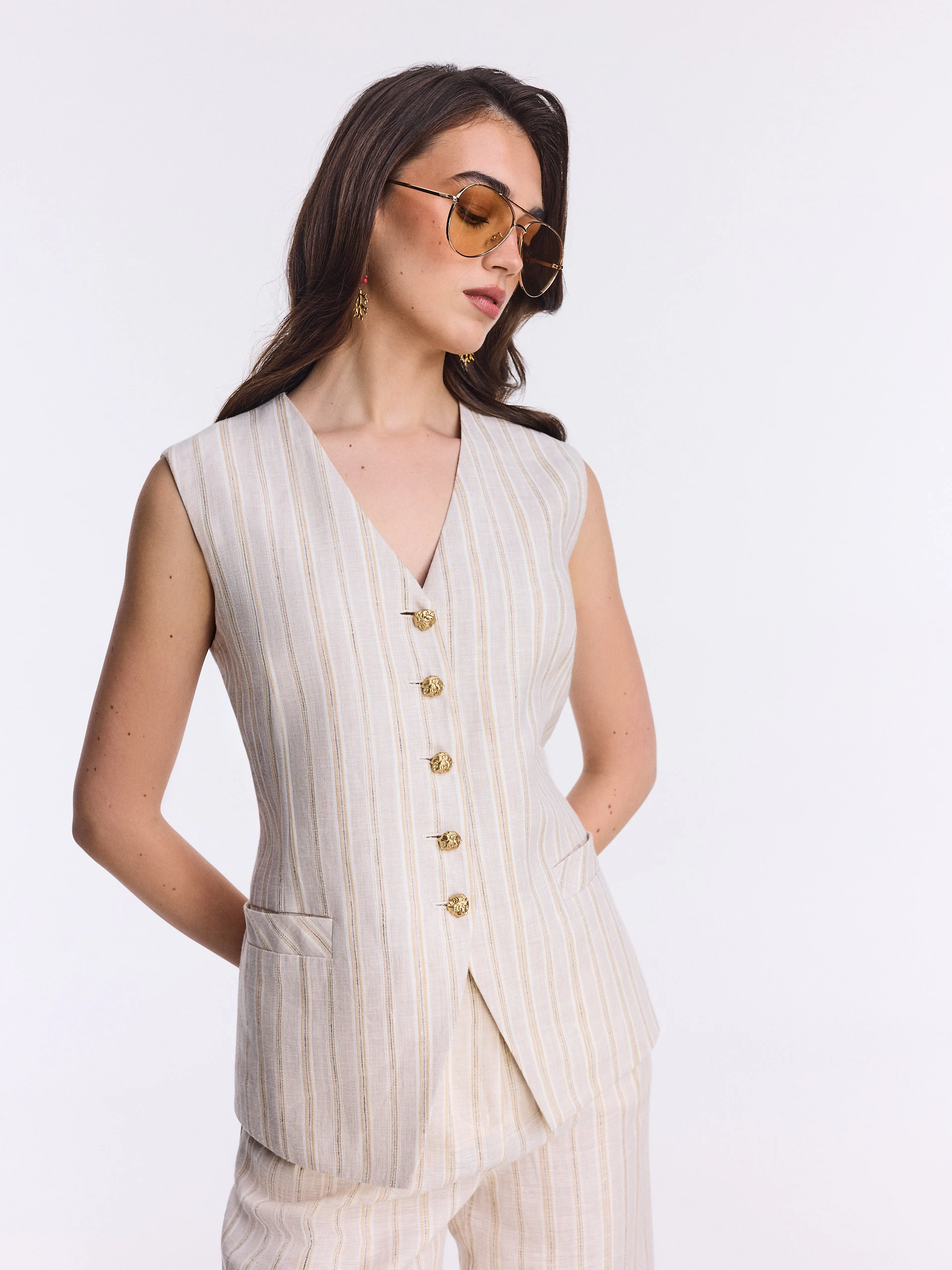 Beige linen vest with metallic thread