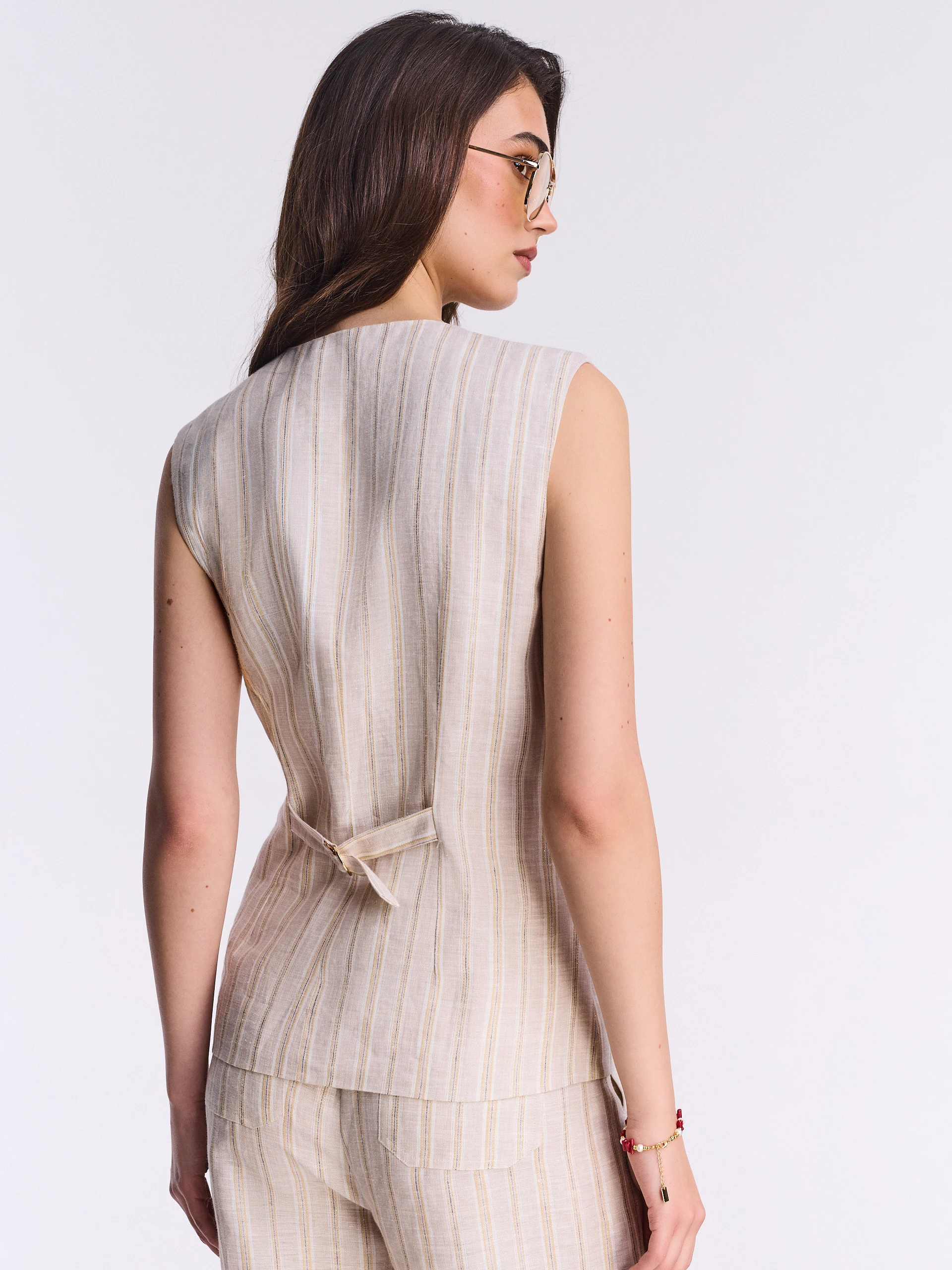 Beige linen vest with metallic thread