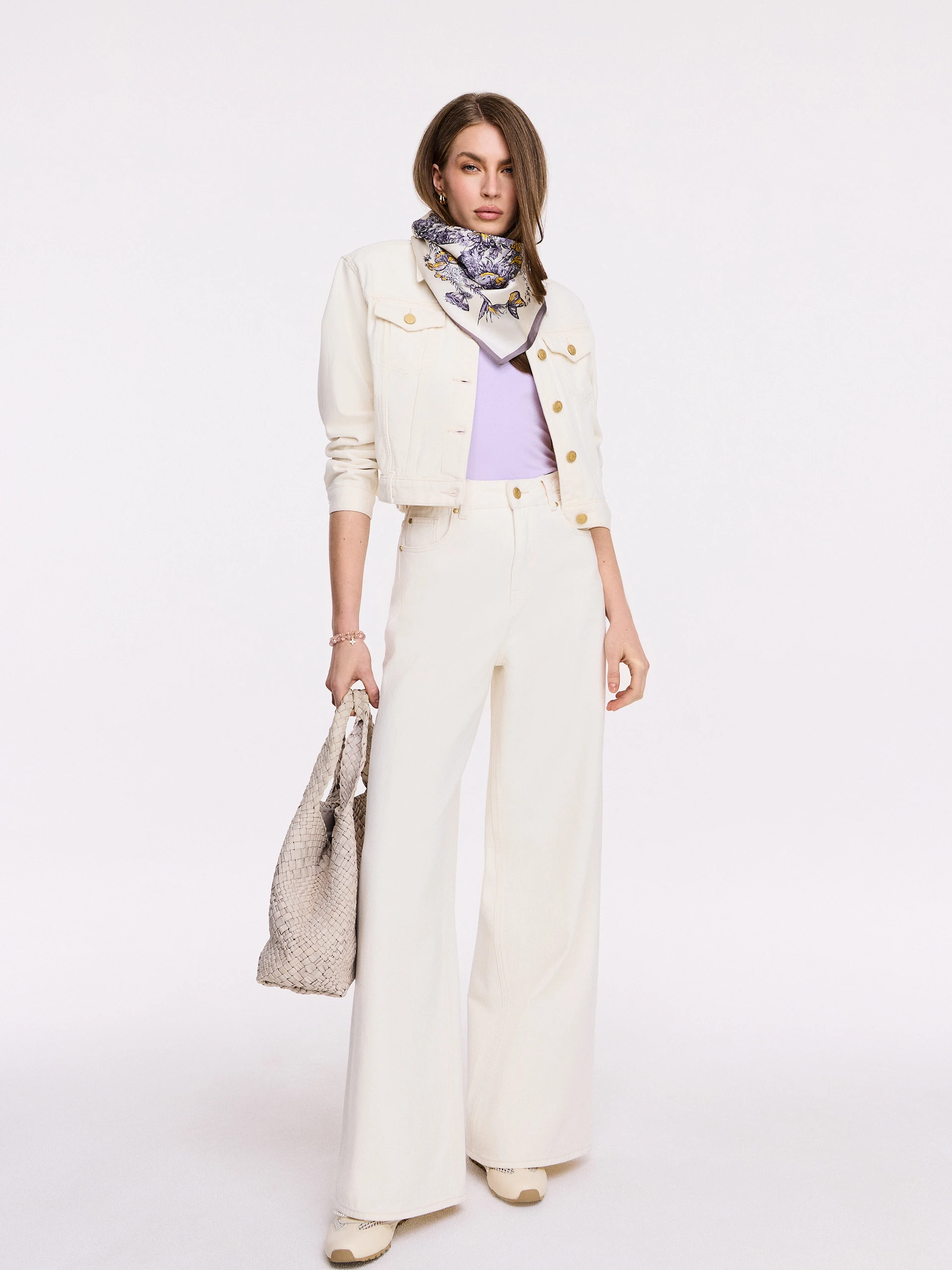 Cream denim jacket with gold buttons