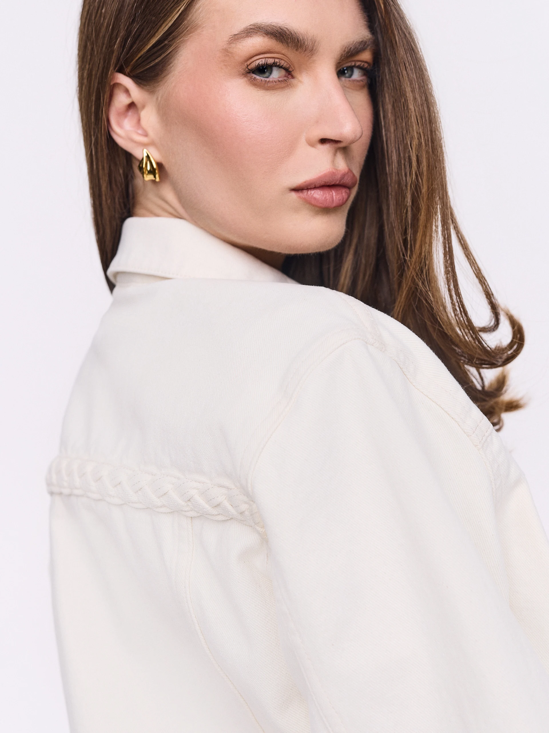 Cream denim jacket with gold buttons