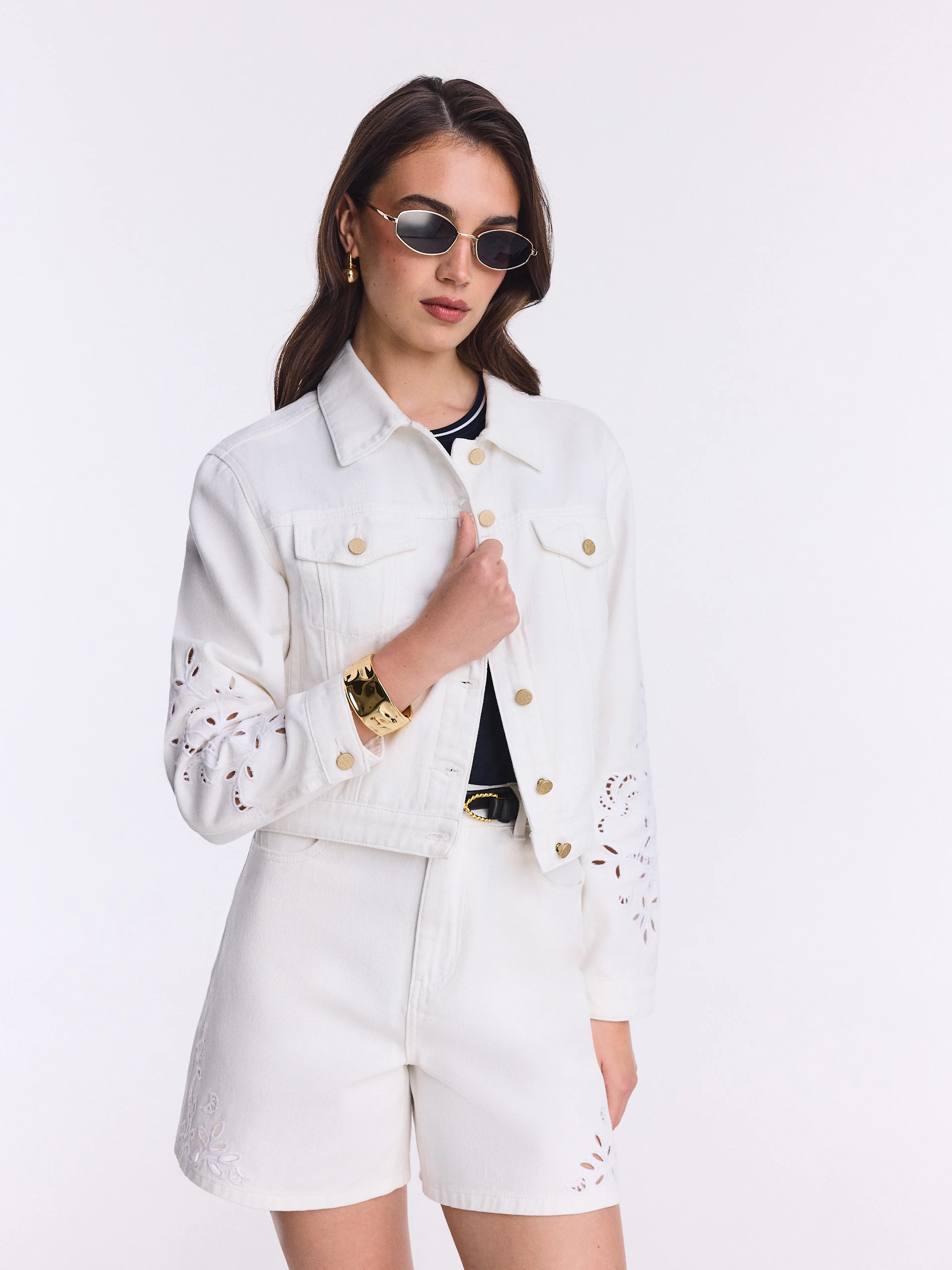 White denim jacket with openwork decoration