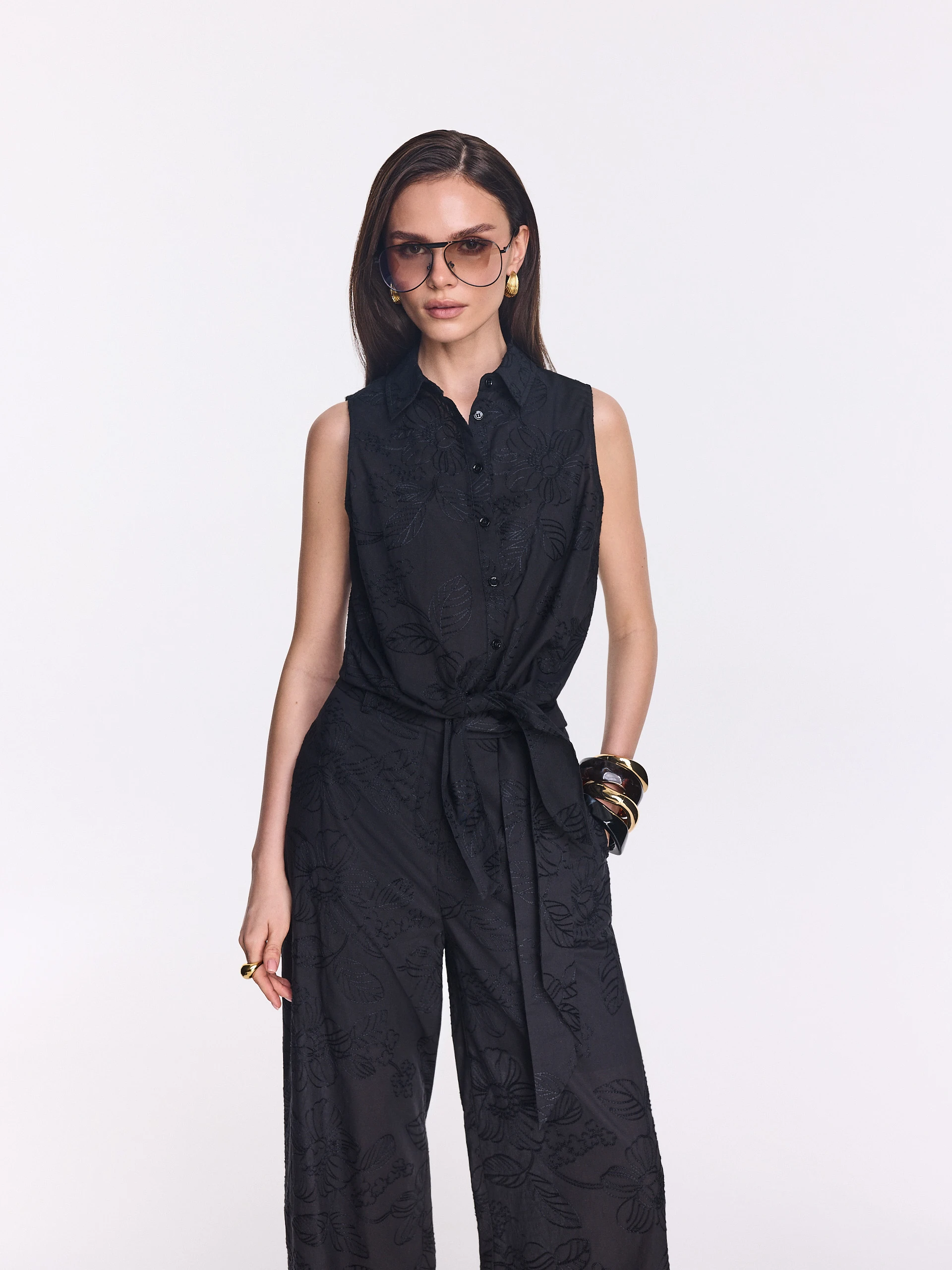 Black sleeveless shirt with floral embroidery