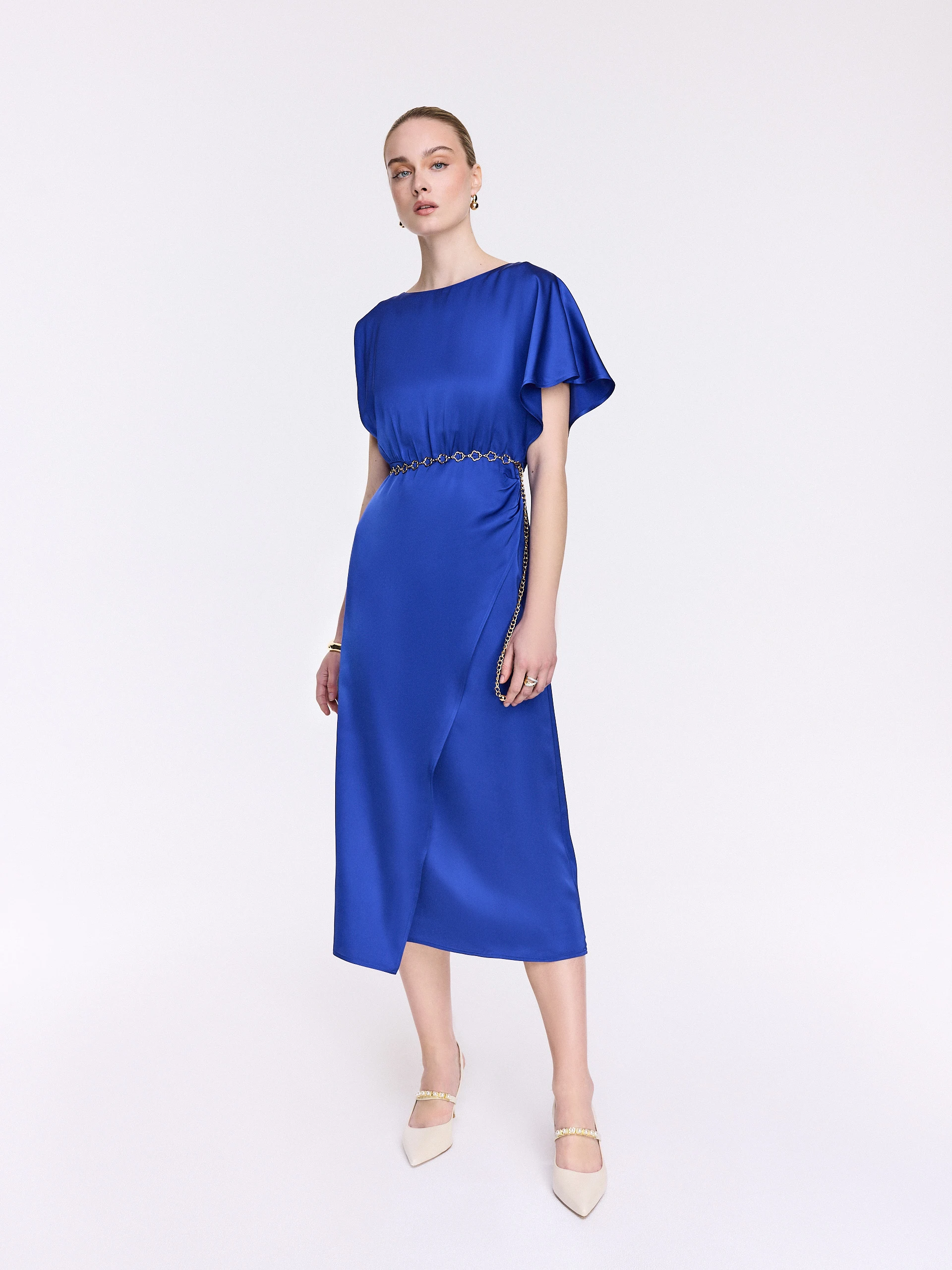 Sapphire-blue dress with an asymmetrical sleeve