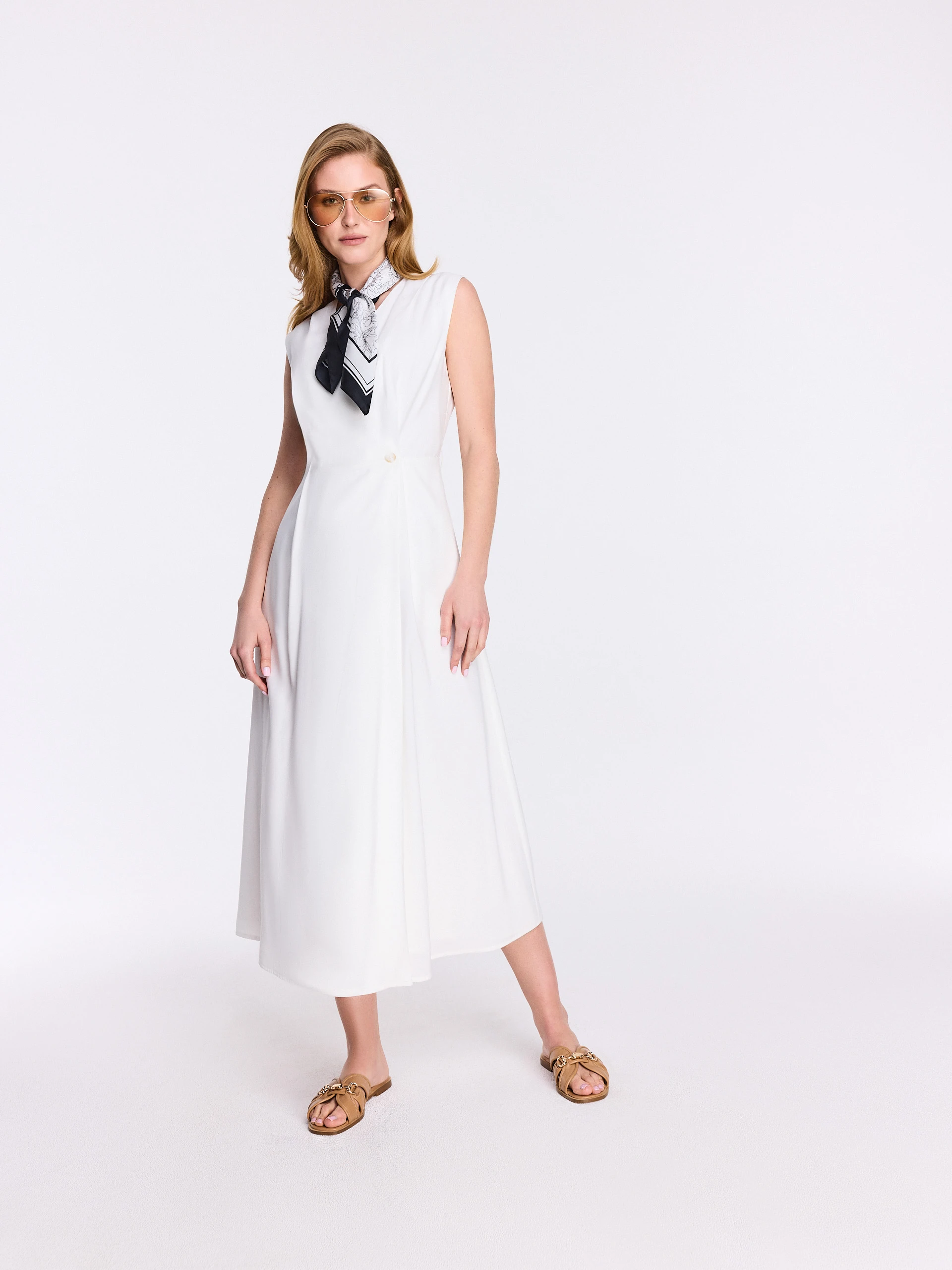 White midi dress with a wrap neckline