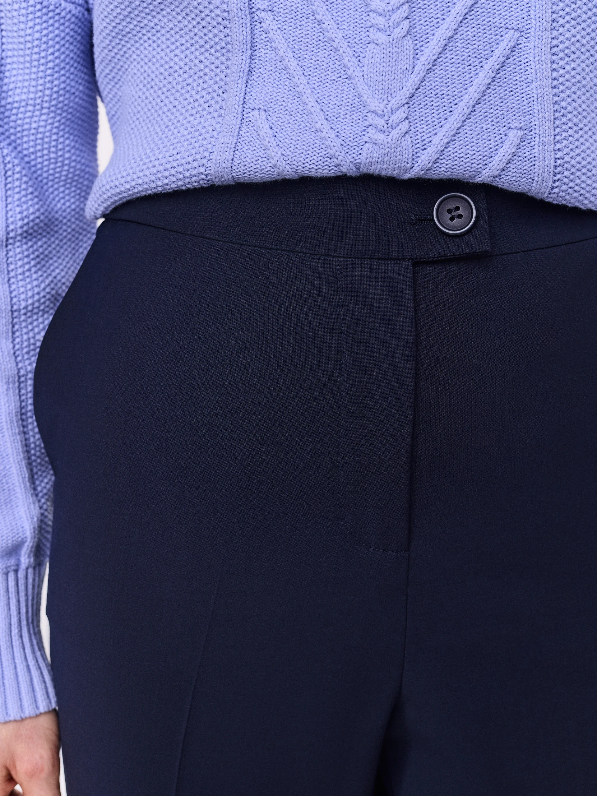 Navy blue high-waisted pants with ⅞ length legs