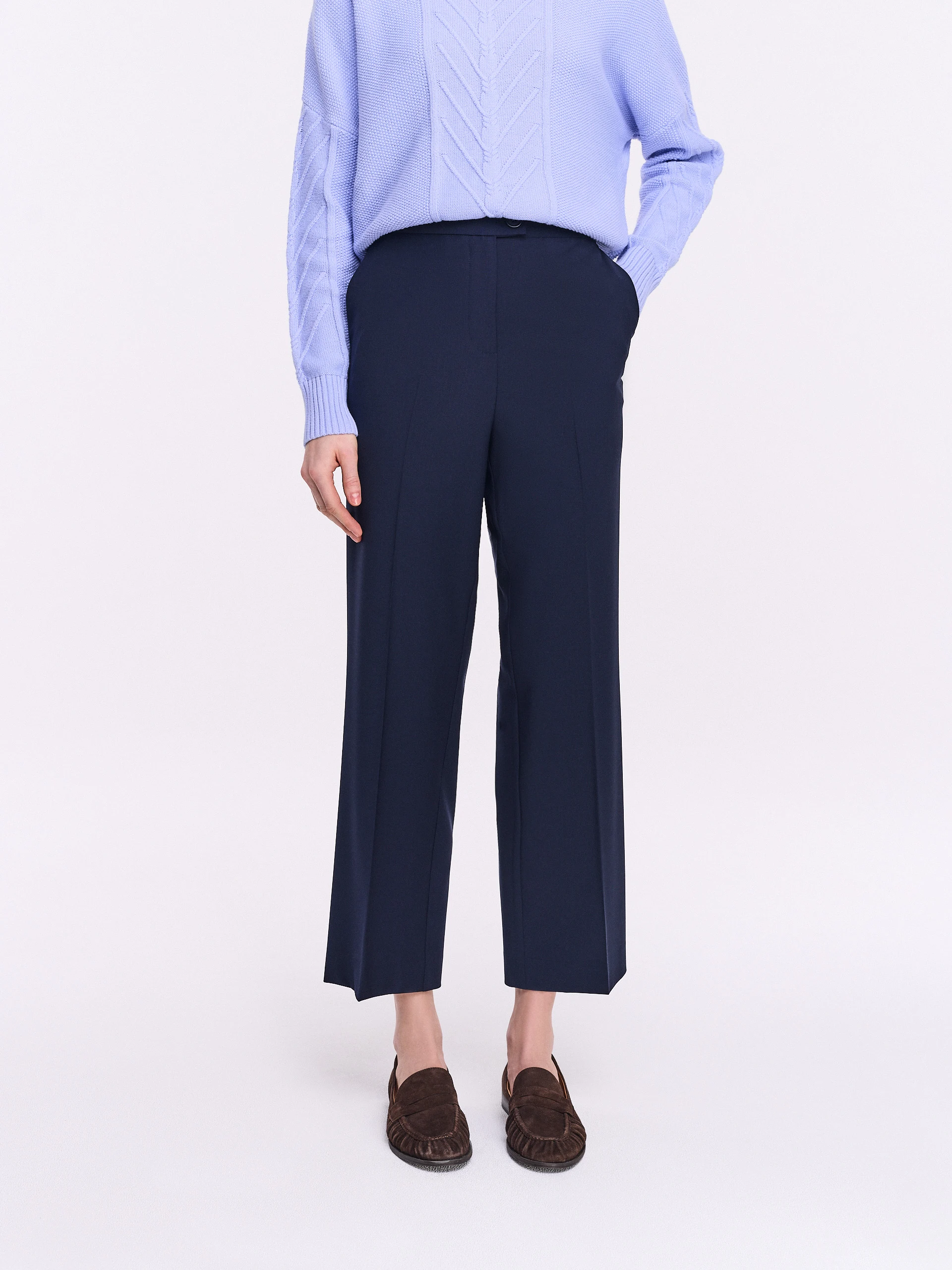Navy blue high-waisted pants with ⅞ length legs