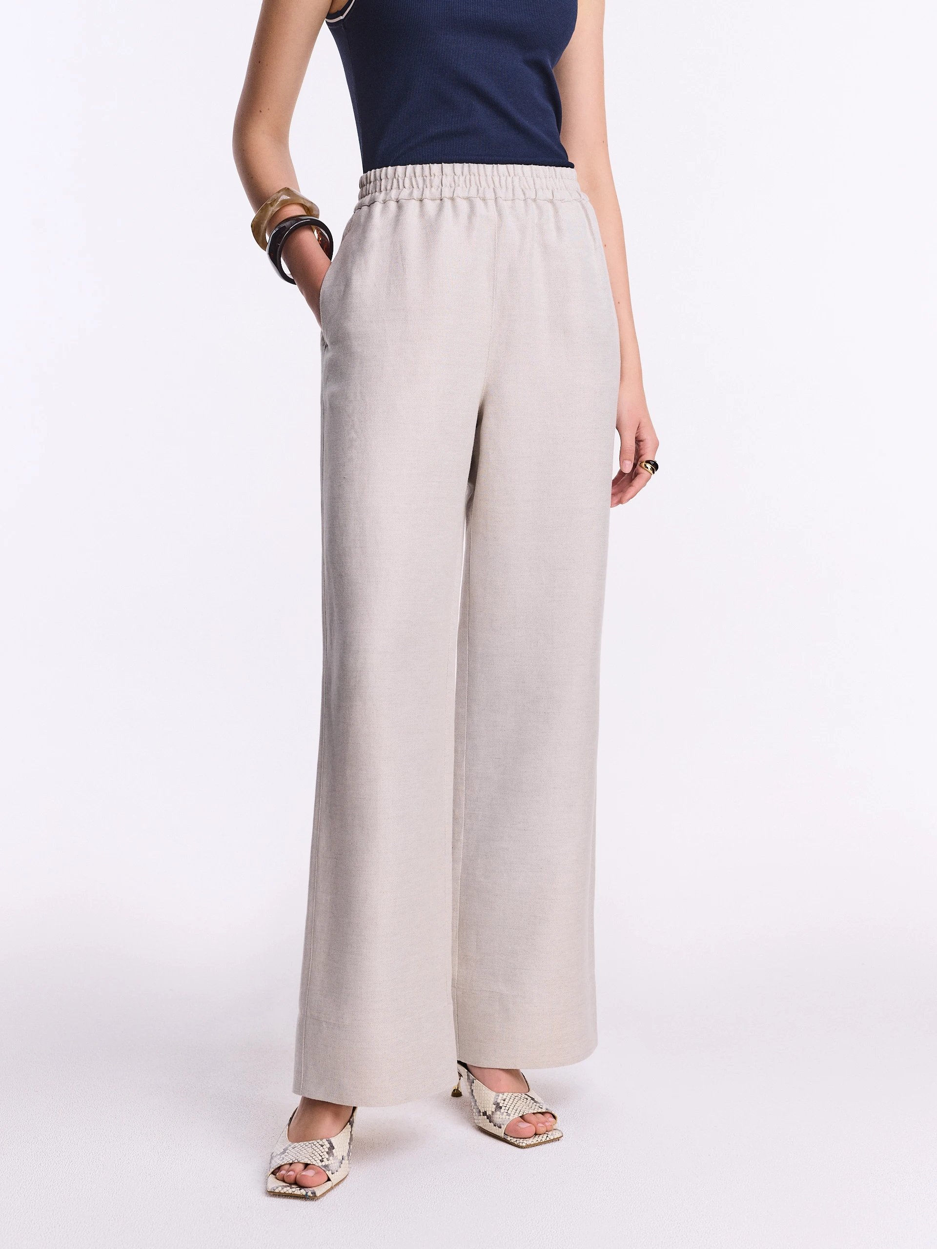Loose beige linen and viscose trousers