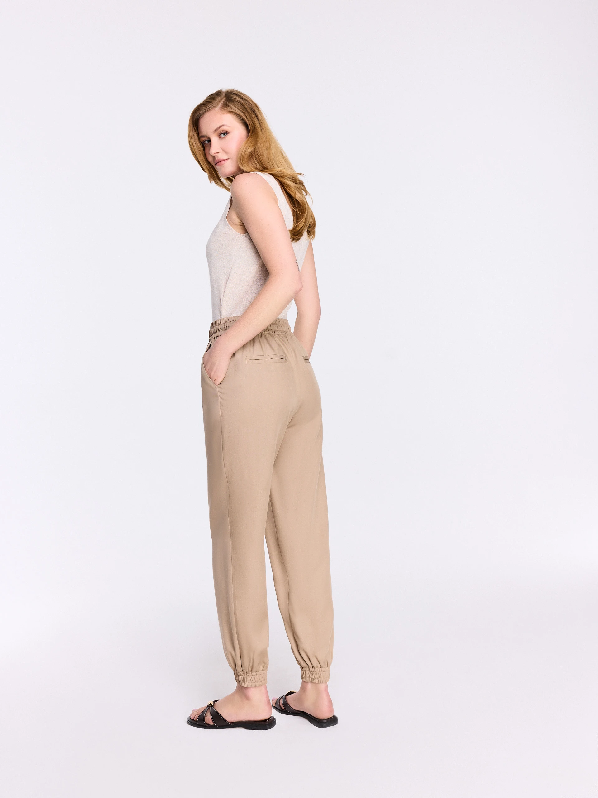 Beige high-waisted jogger pants