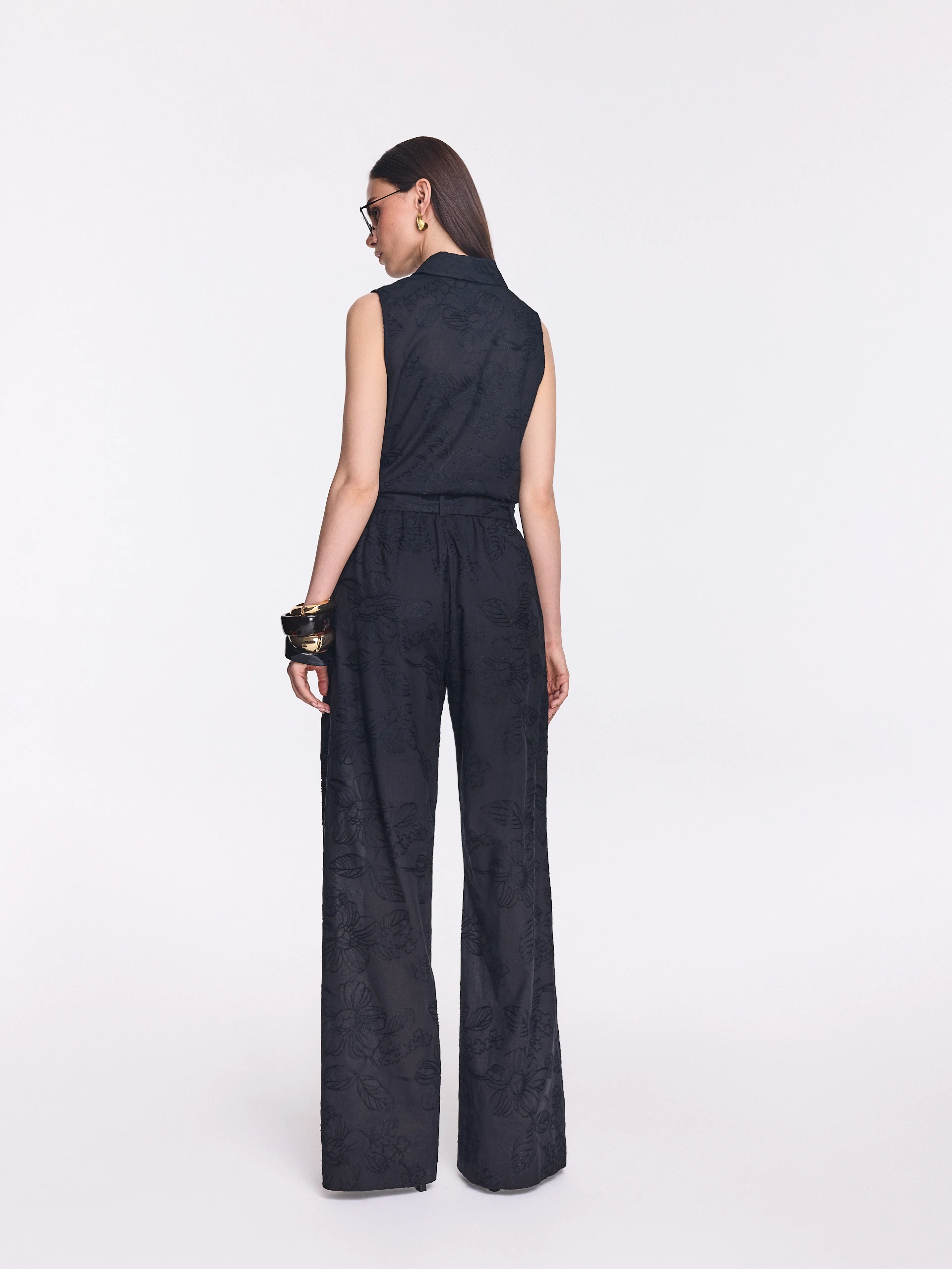 Black wide-leg pants with floral embroidery