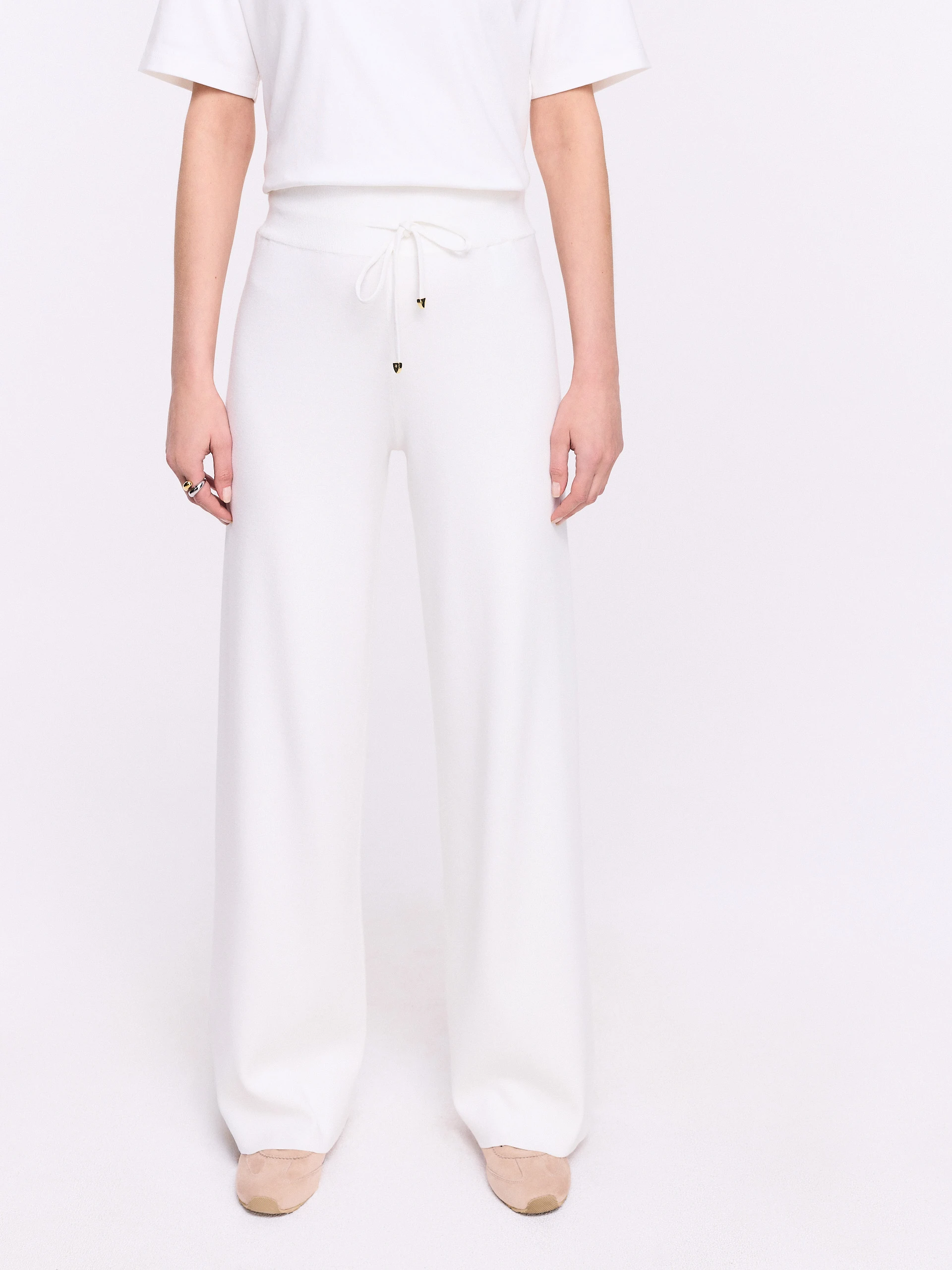 Cream high-waisted knit pants