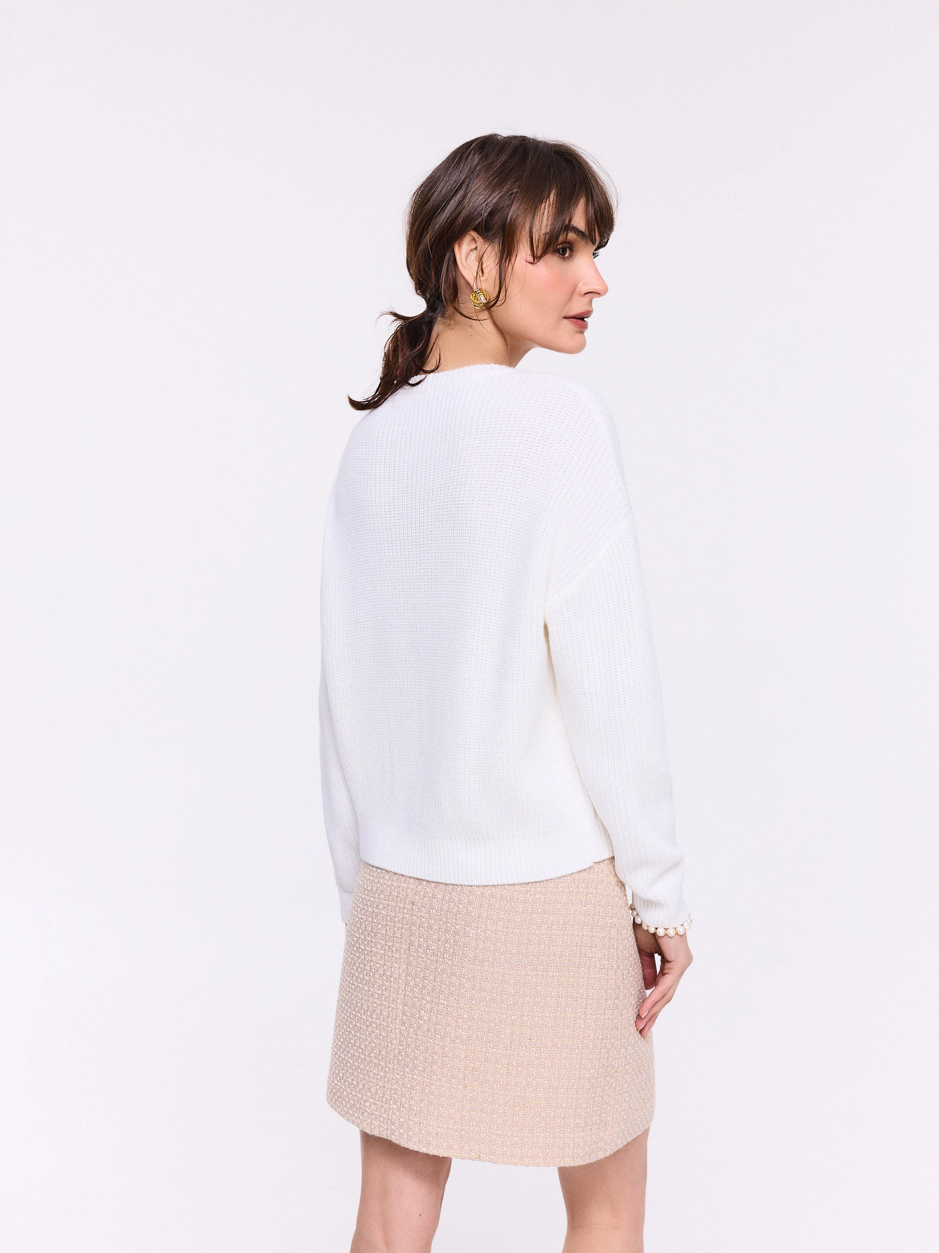 Cream ribbed sweater with braided weave