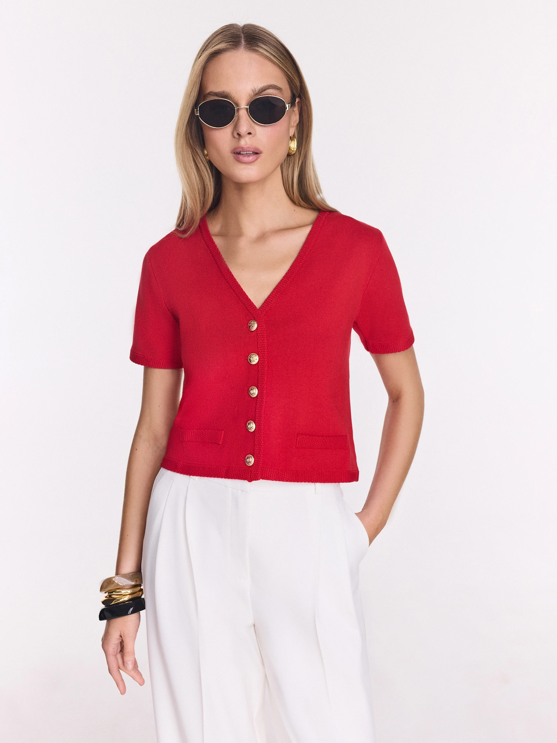 Red sweater with decorative buttons
