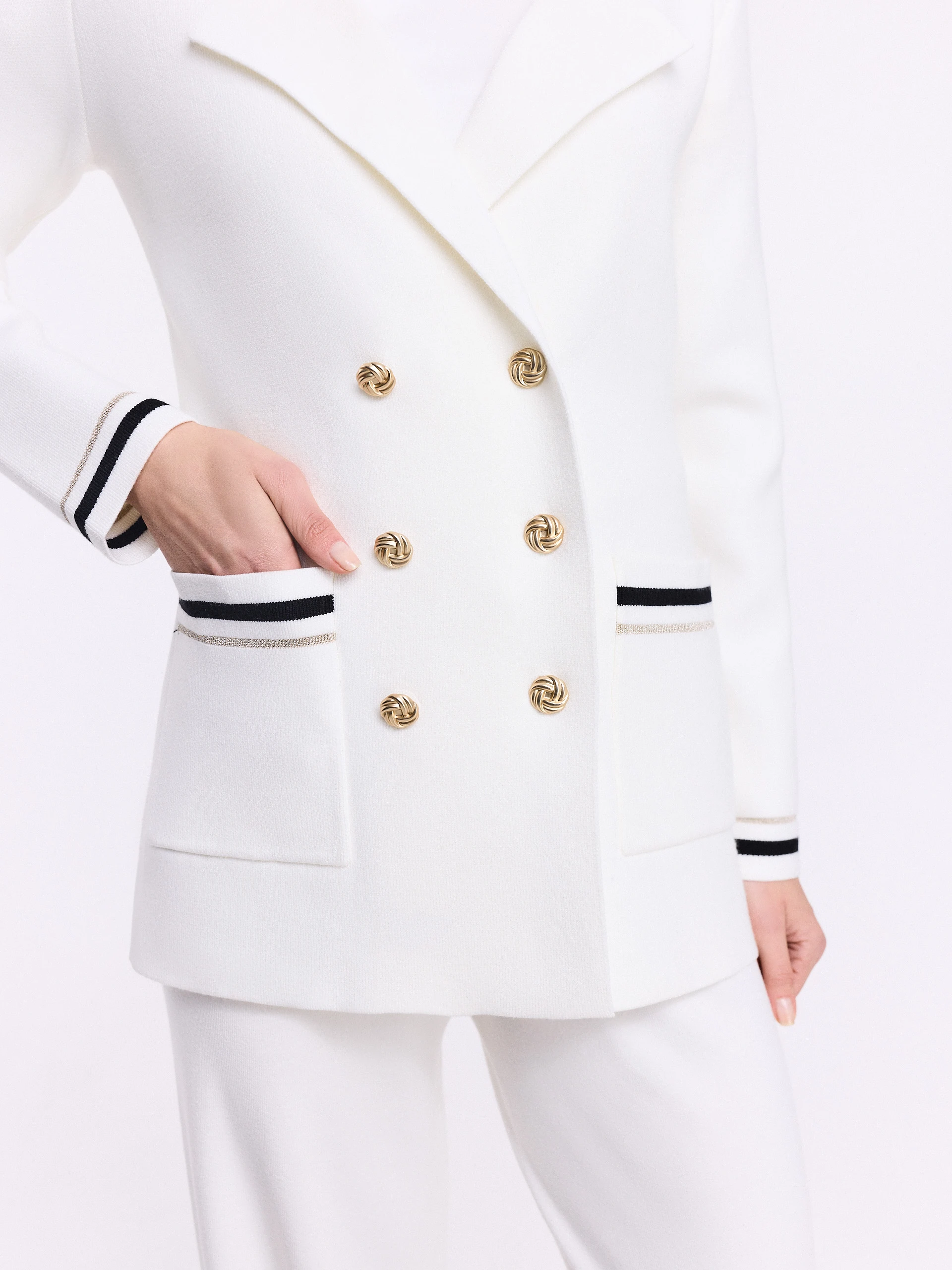 Cream double-breasted jacket with decorative piping