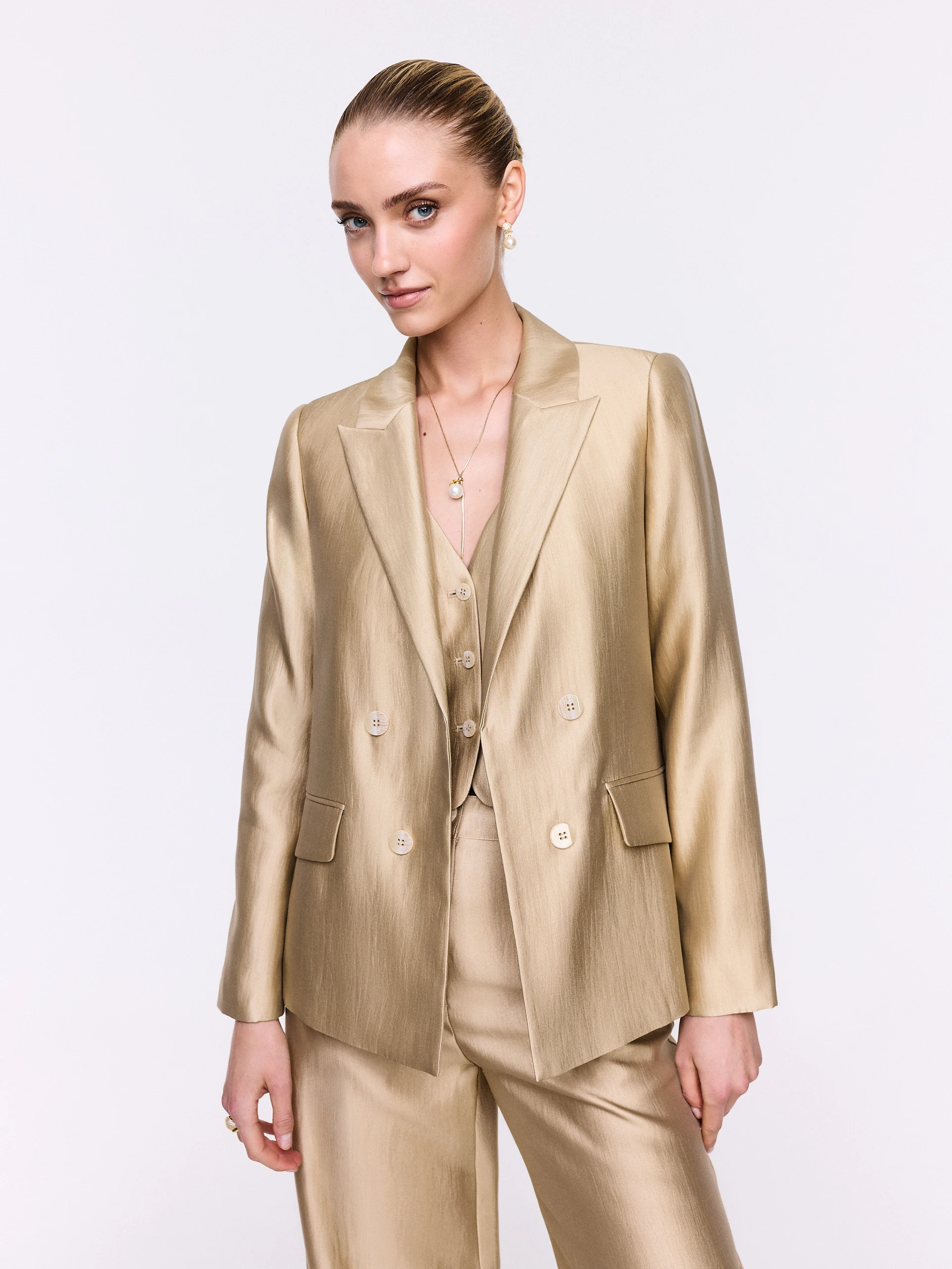 A gold-toned blazer