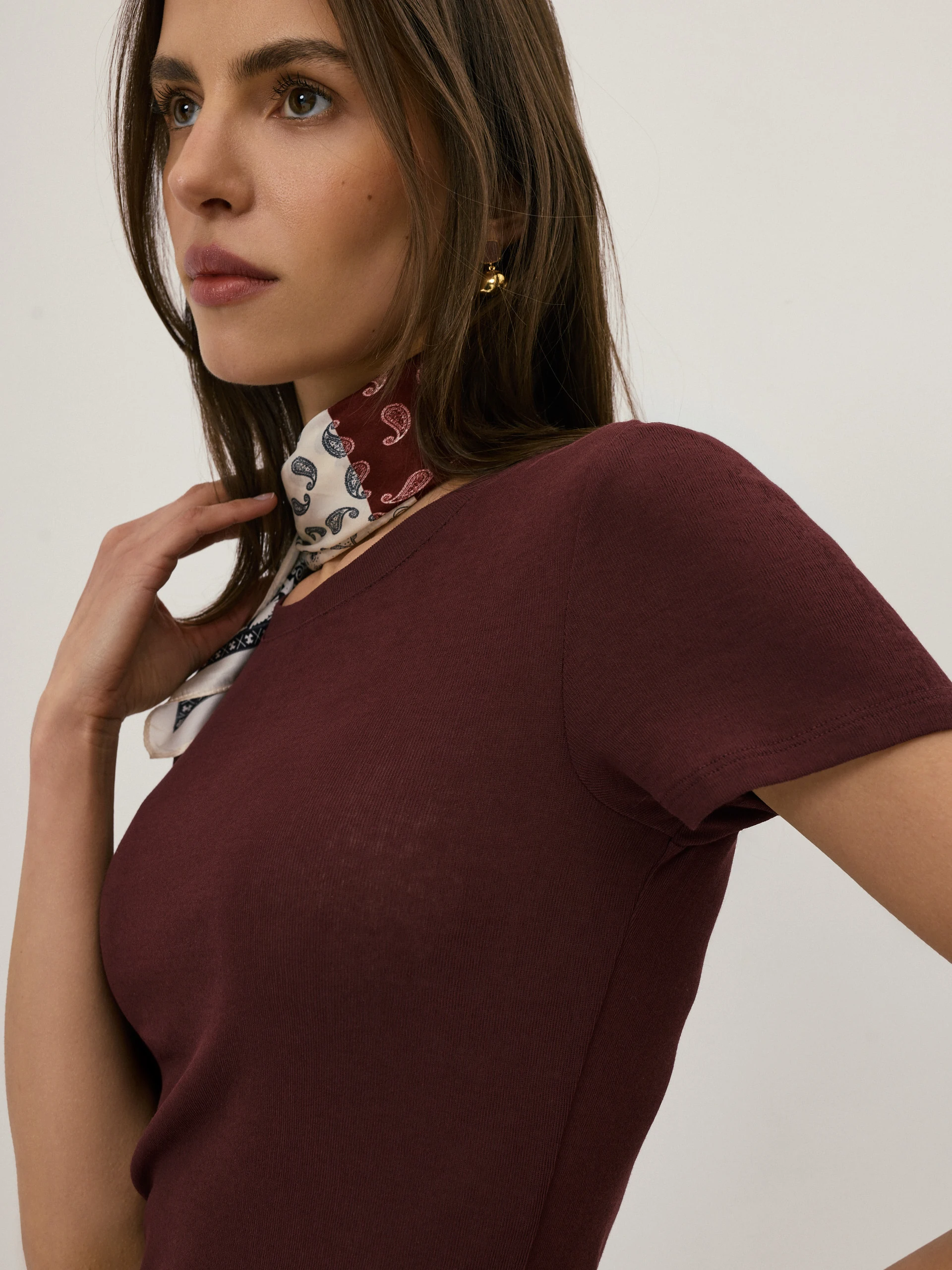 A burgundy short-sleeved blouse