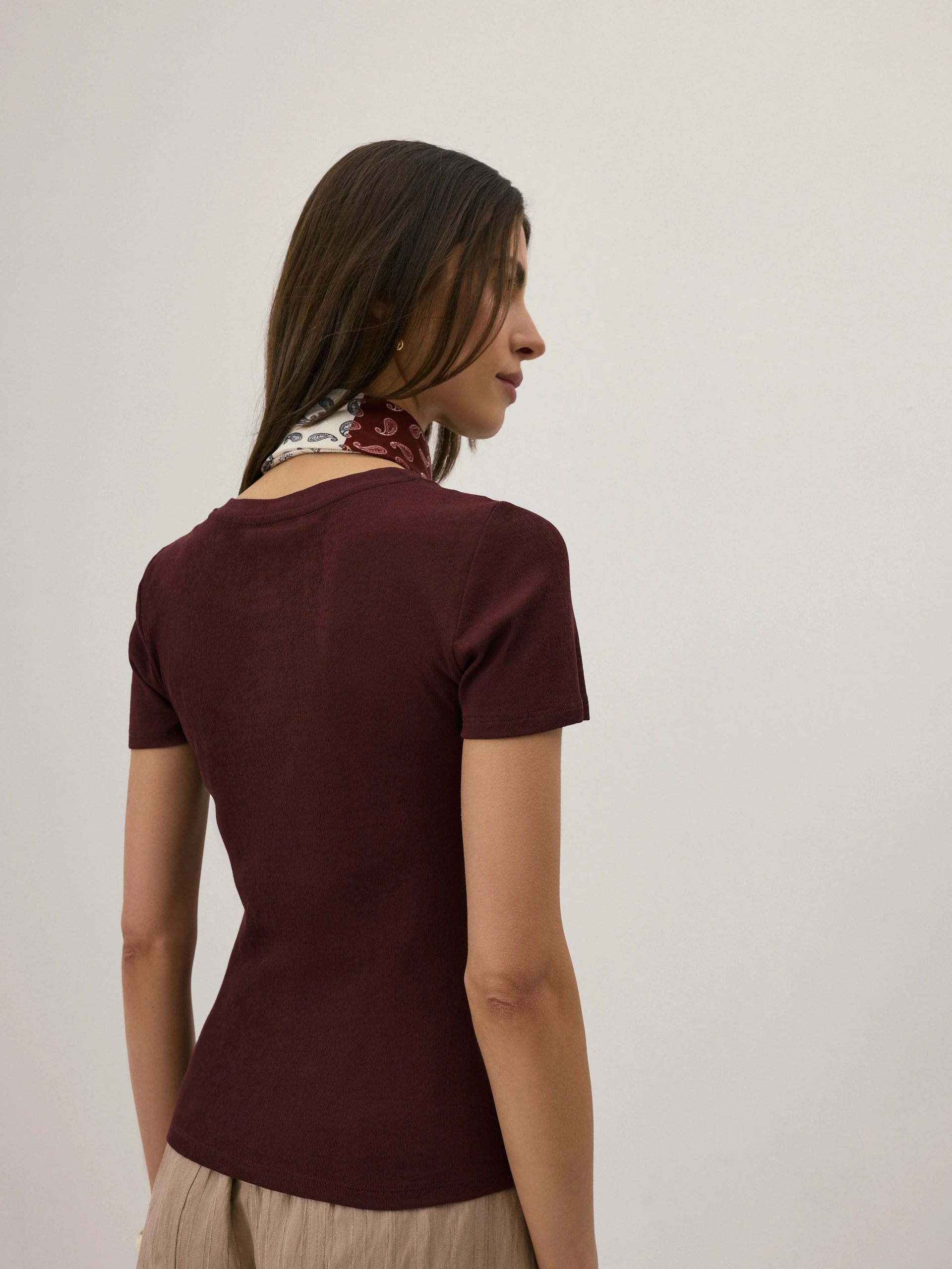 A burgundy short-sleeved blouse