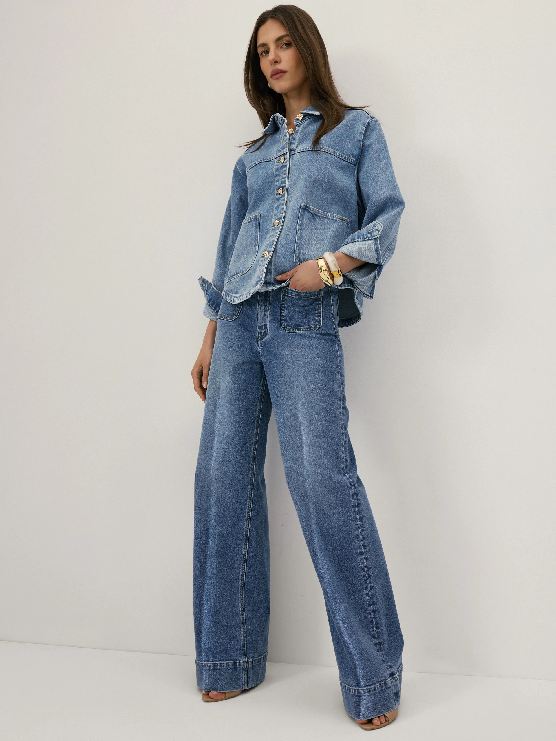 Denim jacket with decorative buttons