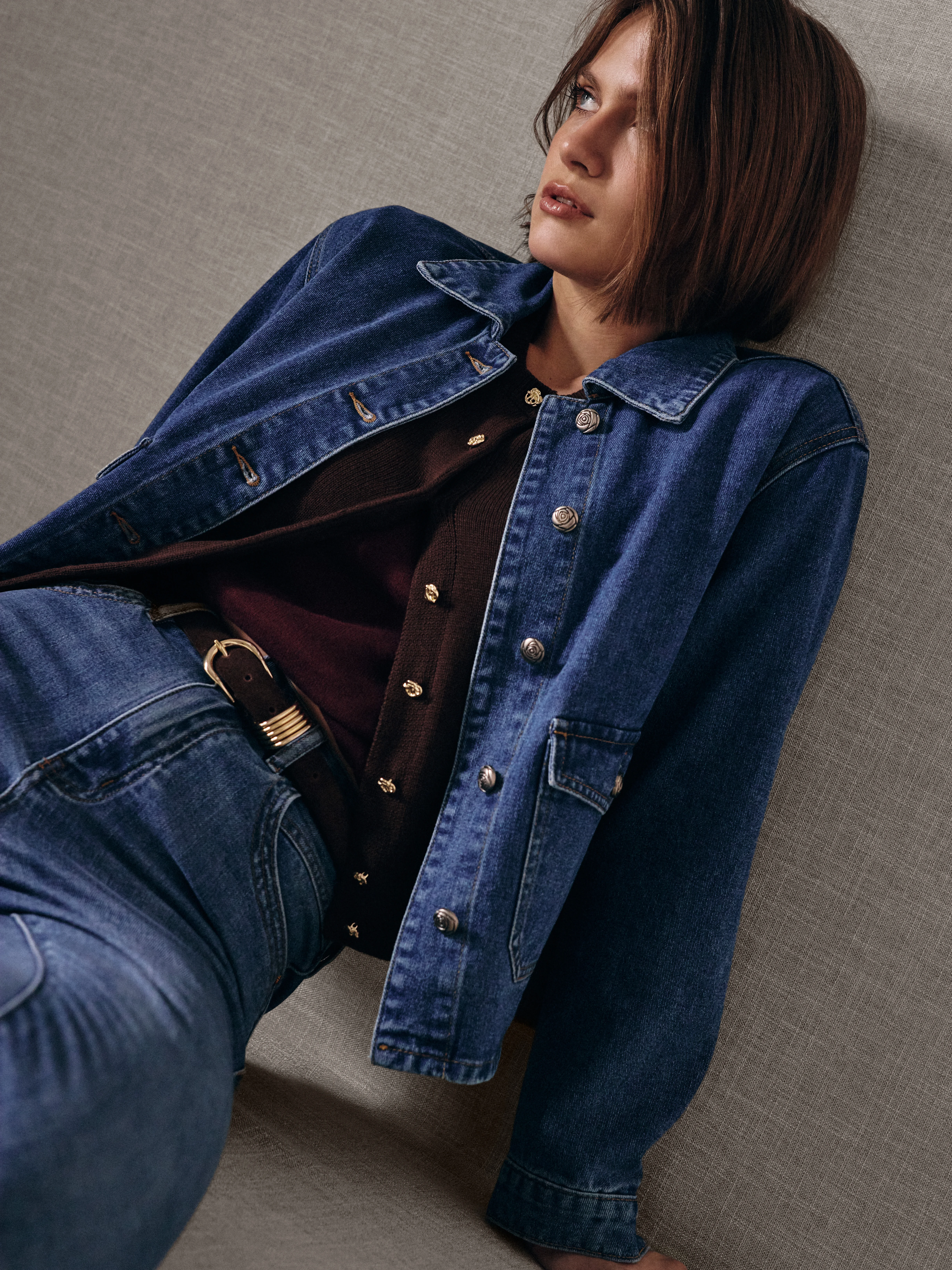 Denim jacket with decorative buttons