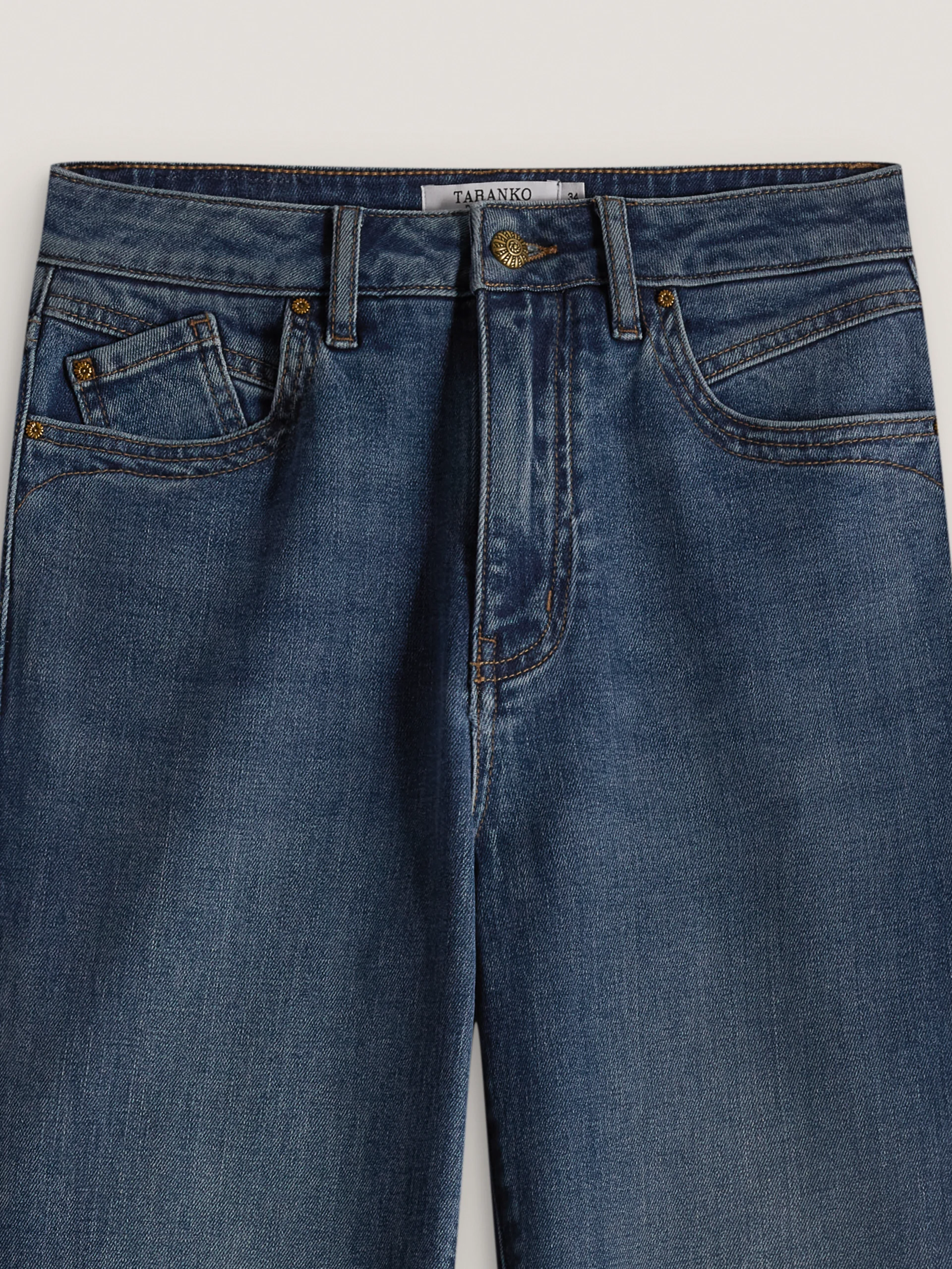 High-waisted, slim-fit jeans
