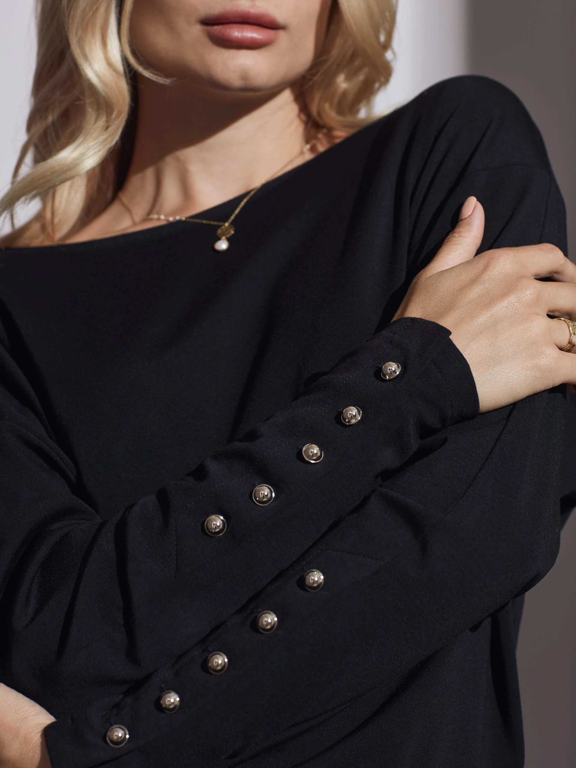 BLACK BLOUSE WITH BUTTONS ON SLEEVES