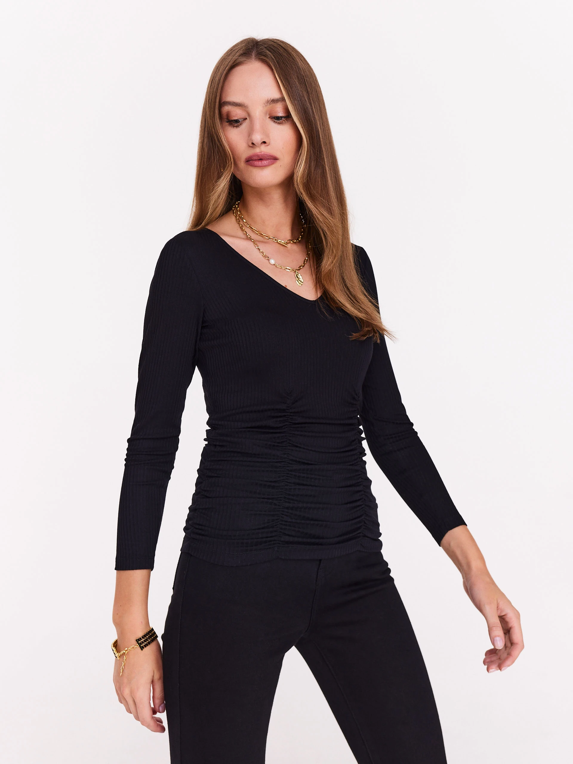 Black blouse with V neckline and back cutout