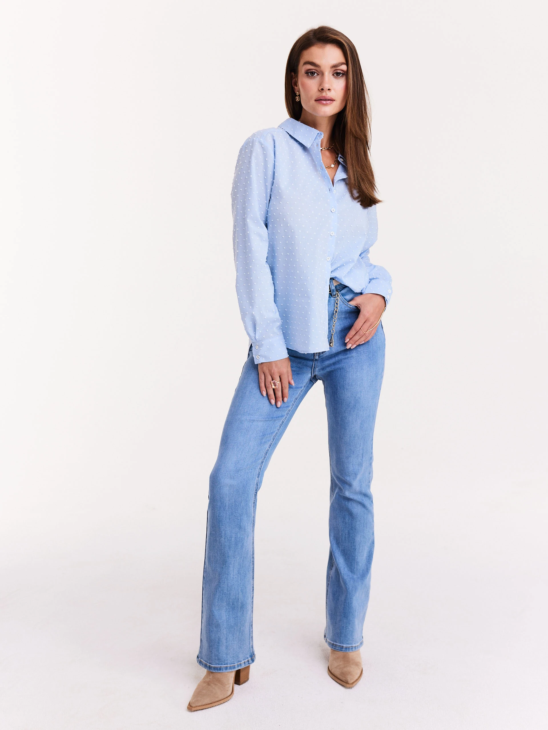Loose blue shirt with binding on the back