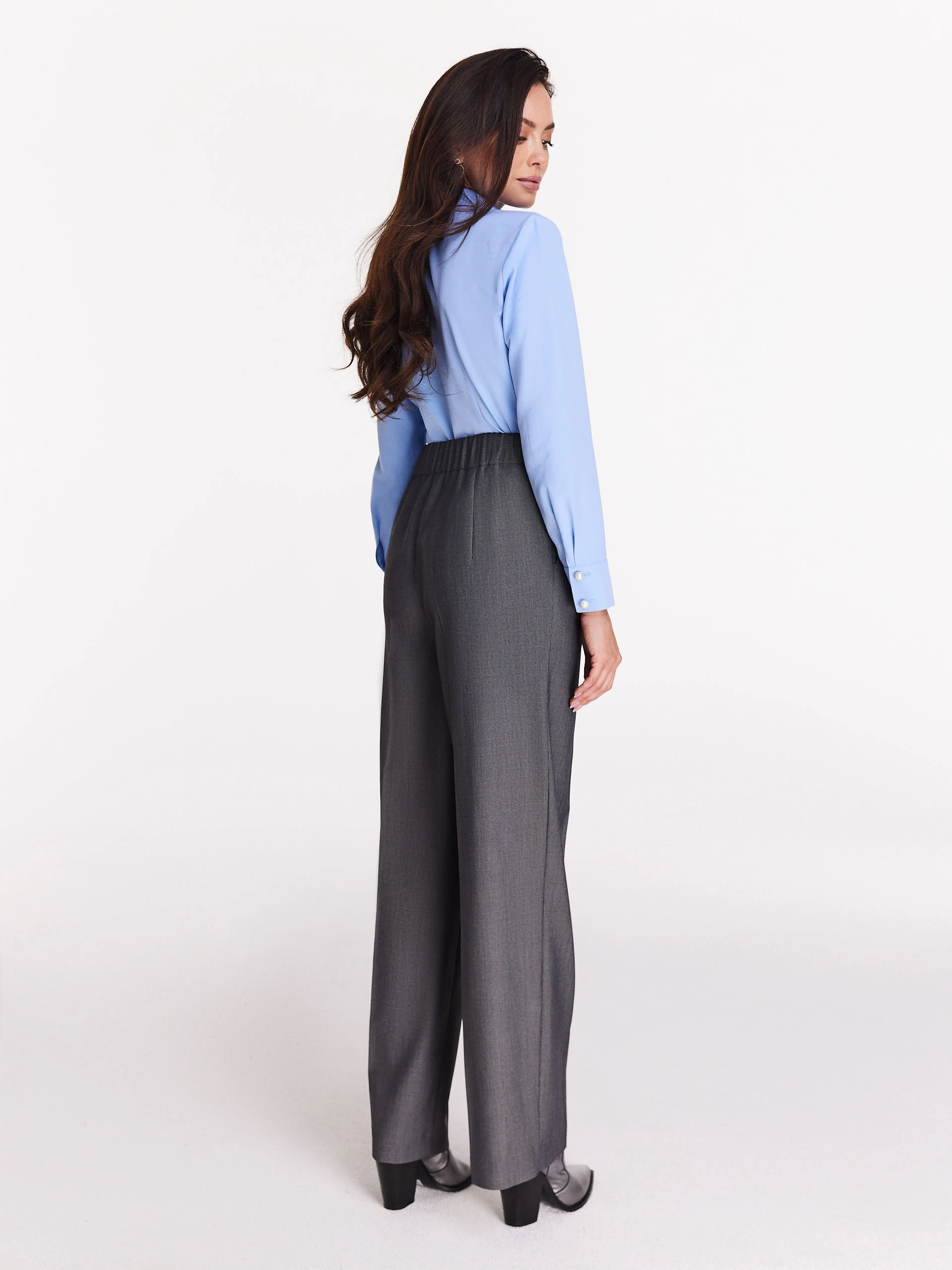 Grey high-waisted pants with elastic waistband