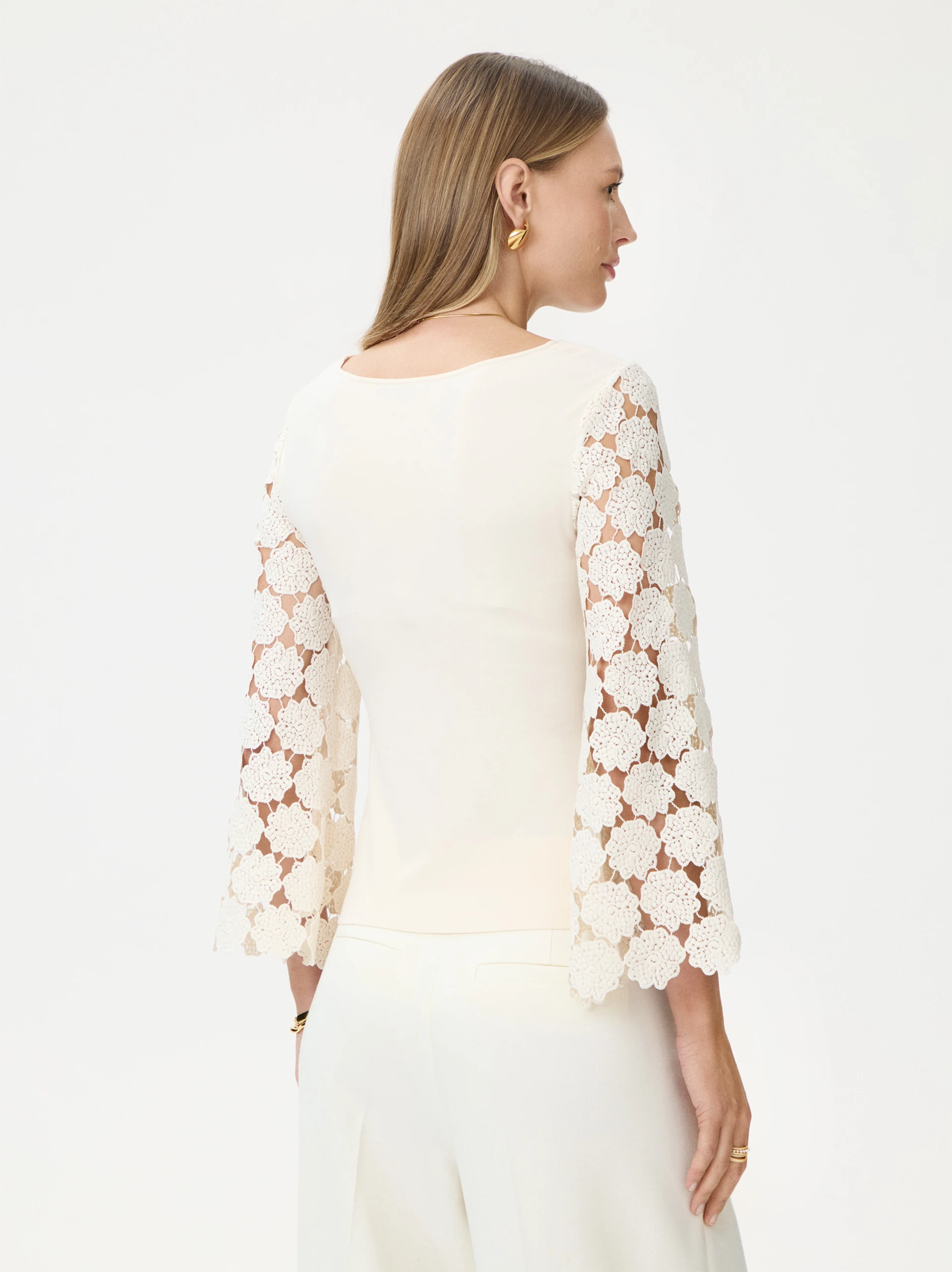 Cream blouse with lace sleeves