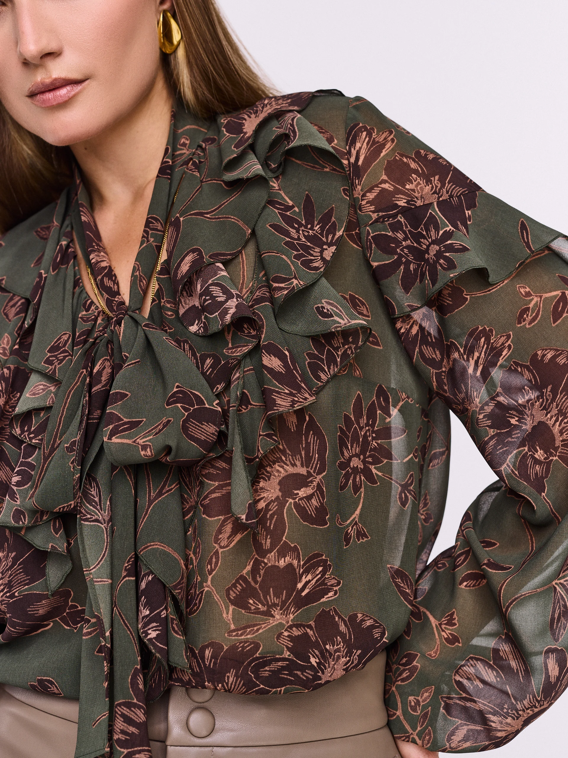 Dark green floral blouse with ruffles