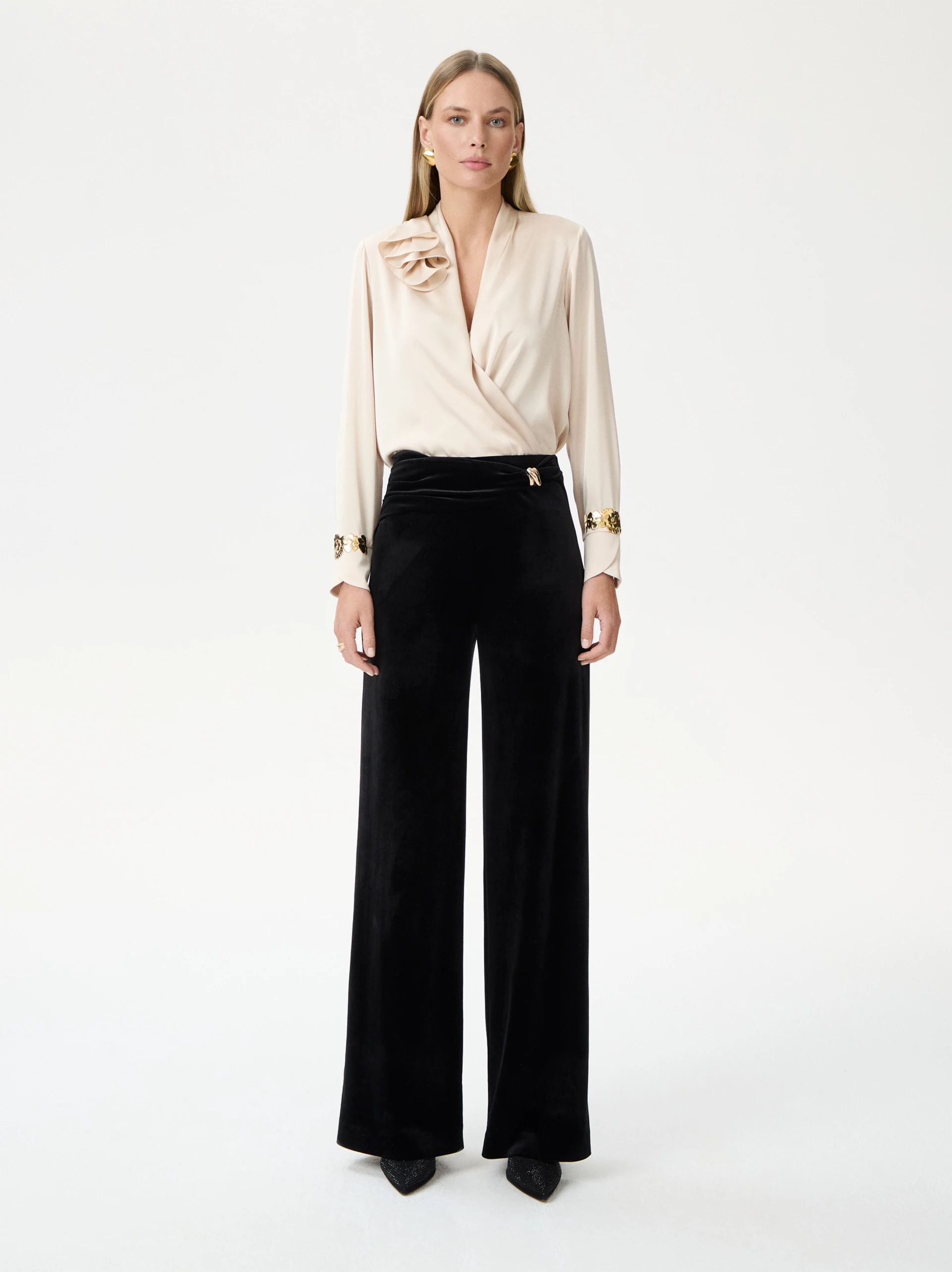 High-waisted black velour pants