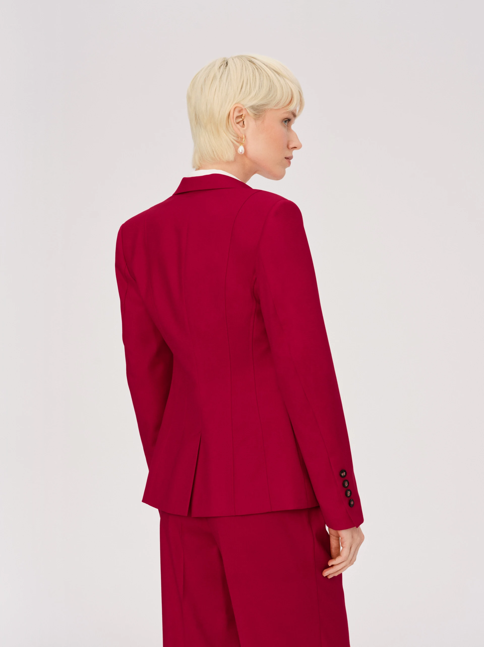 Red single-button suit jacket