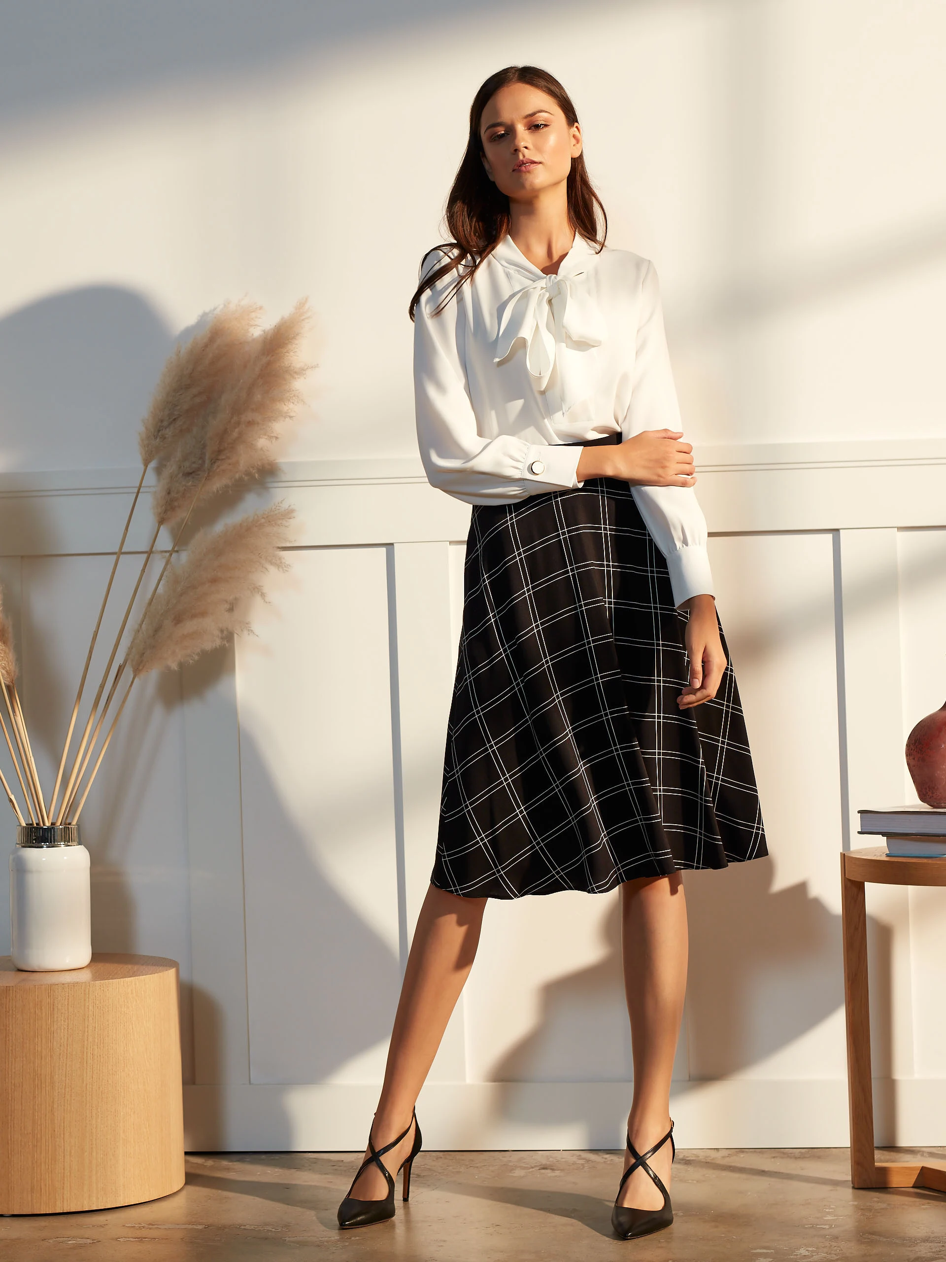 BLOUSE WITH A TIE AT THE NECKLINE