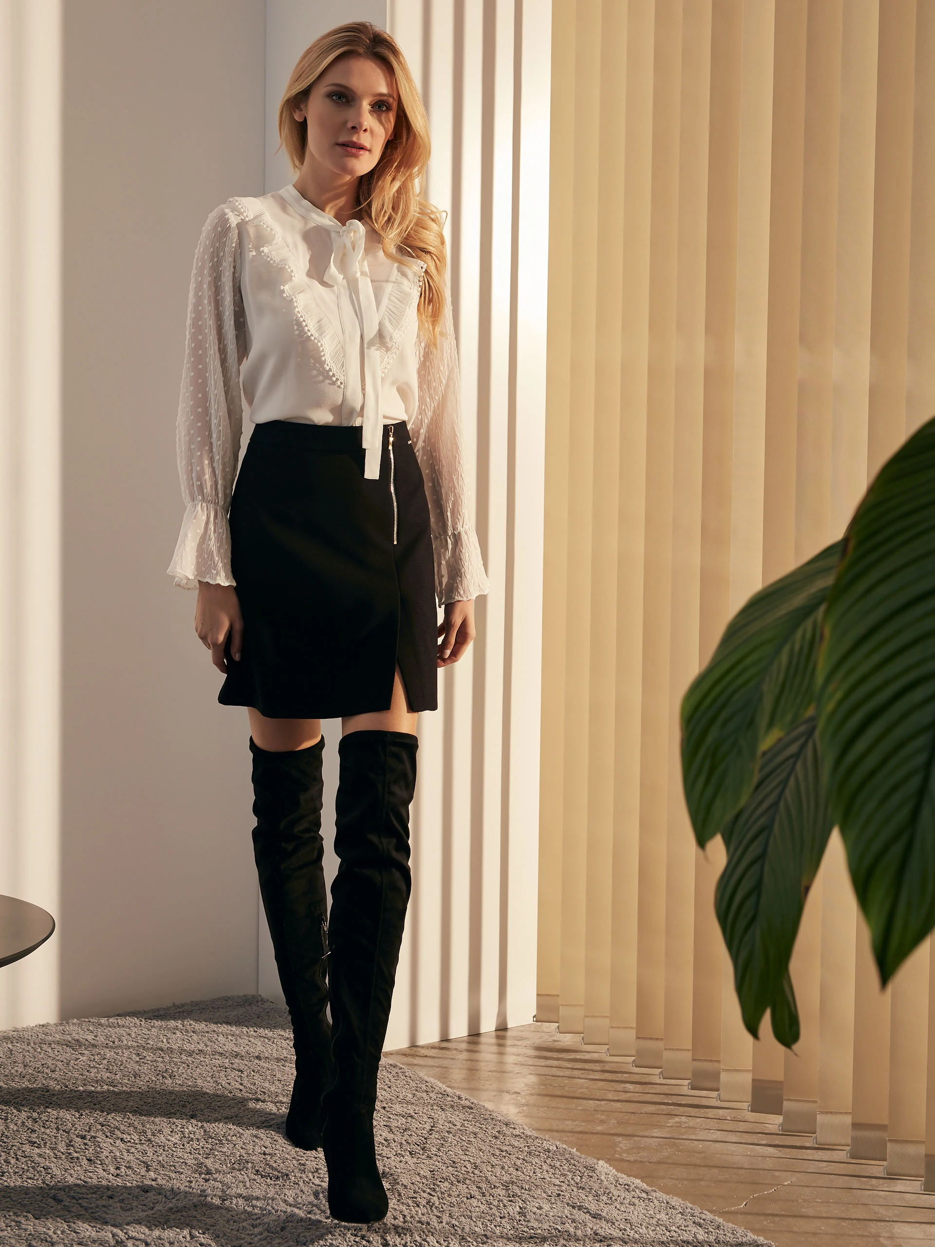 TRAPEZE SKIRT WITH CUT-OUTS